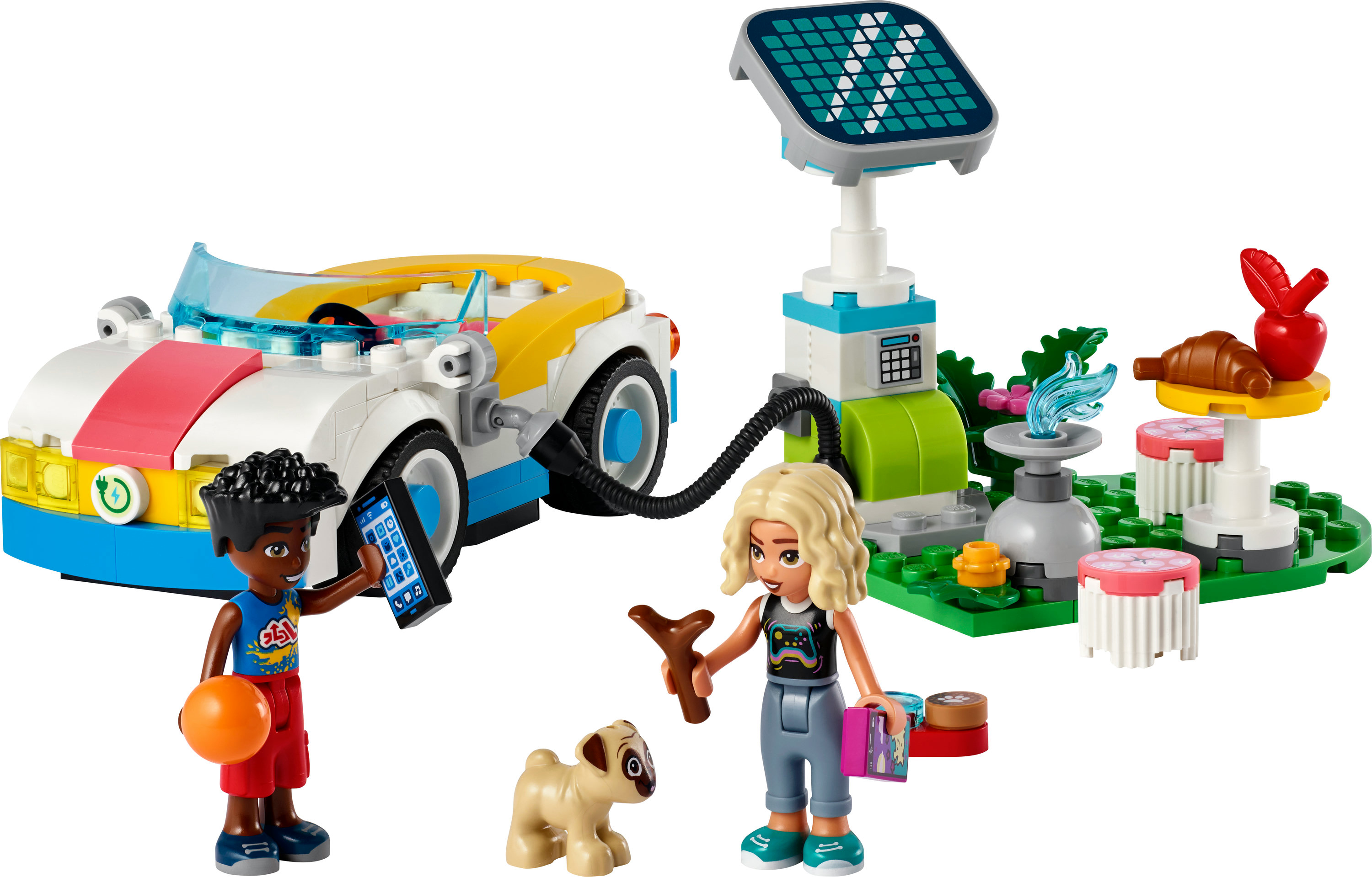 Een LEGO Friends set met figuren, een auto, een laadstation en een picknickplaats met eten.