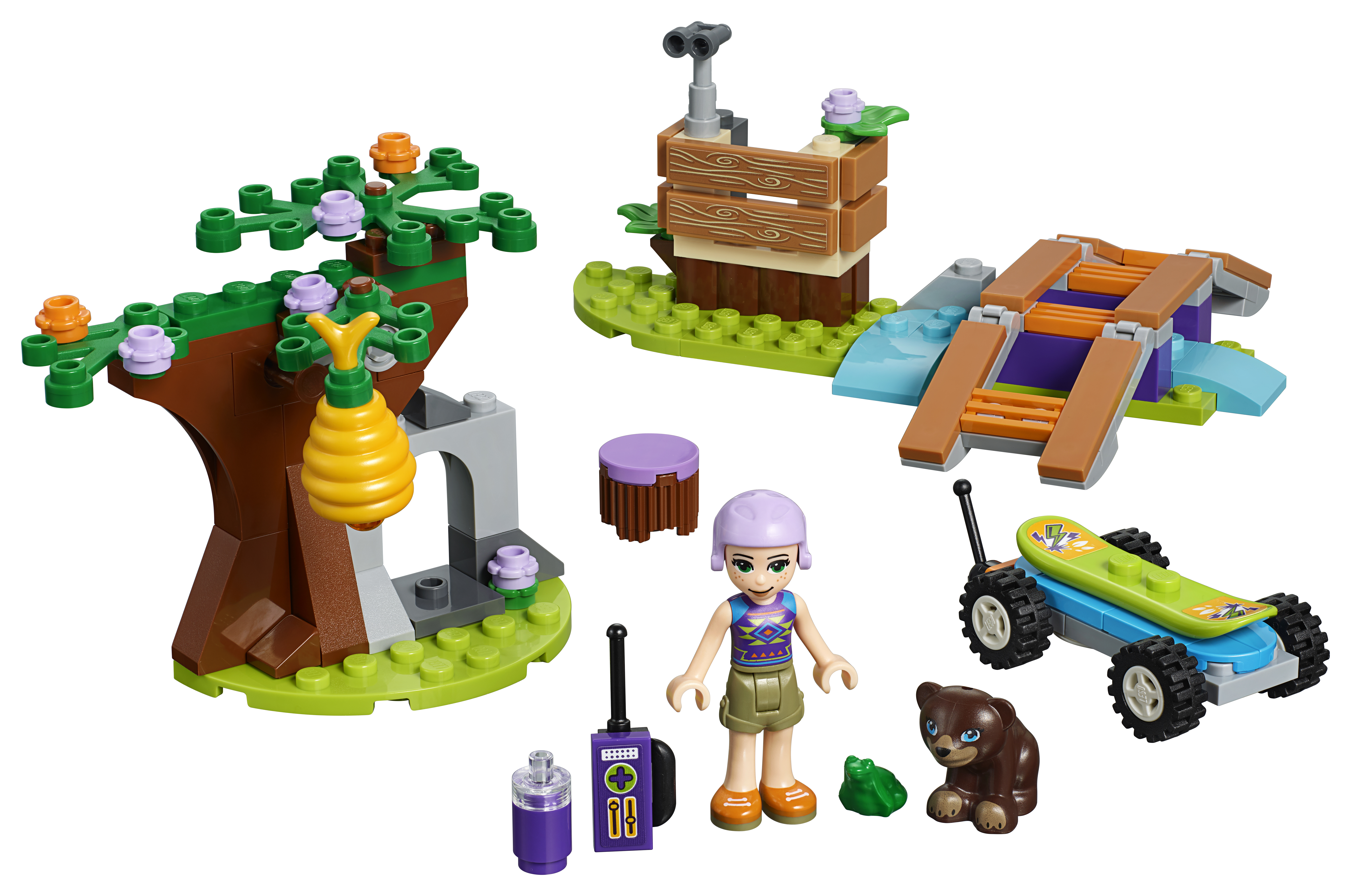 Lego Friends-Set. Enthält einen Baum mit Bienenstock, ein Mädchen, einen Bären, ein Skateboard und eine Brücke.