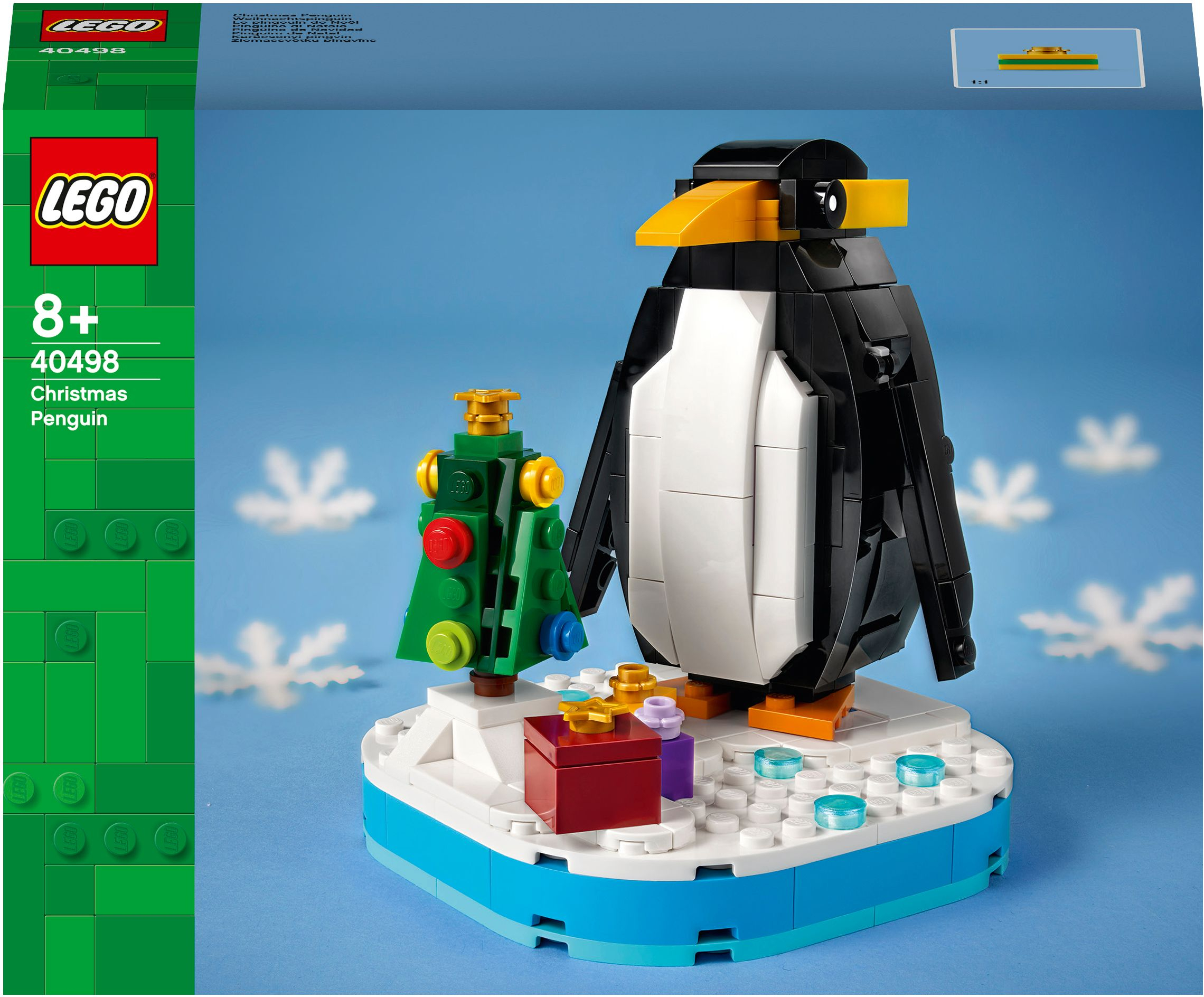 Ein LEGO Set mit einem schwarz-weißen Pinguin, einem Weihnachtsbaum und Geschenken.