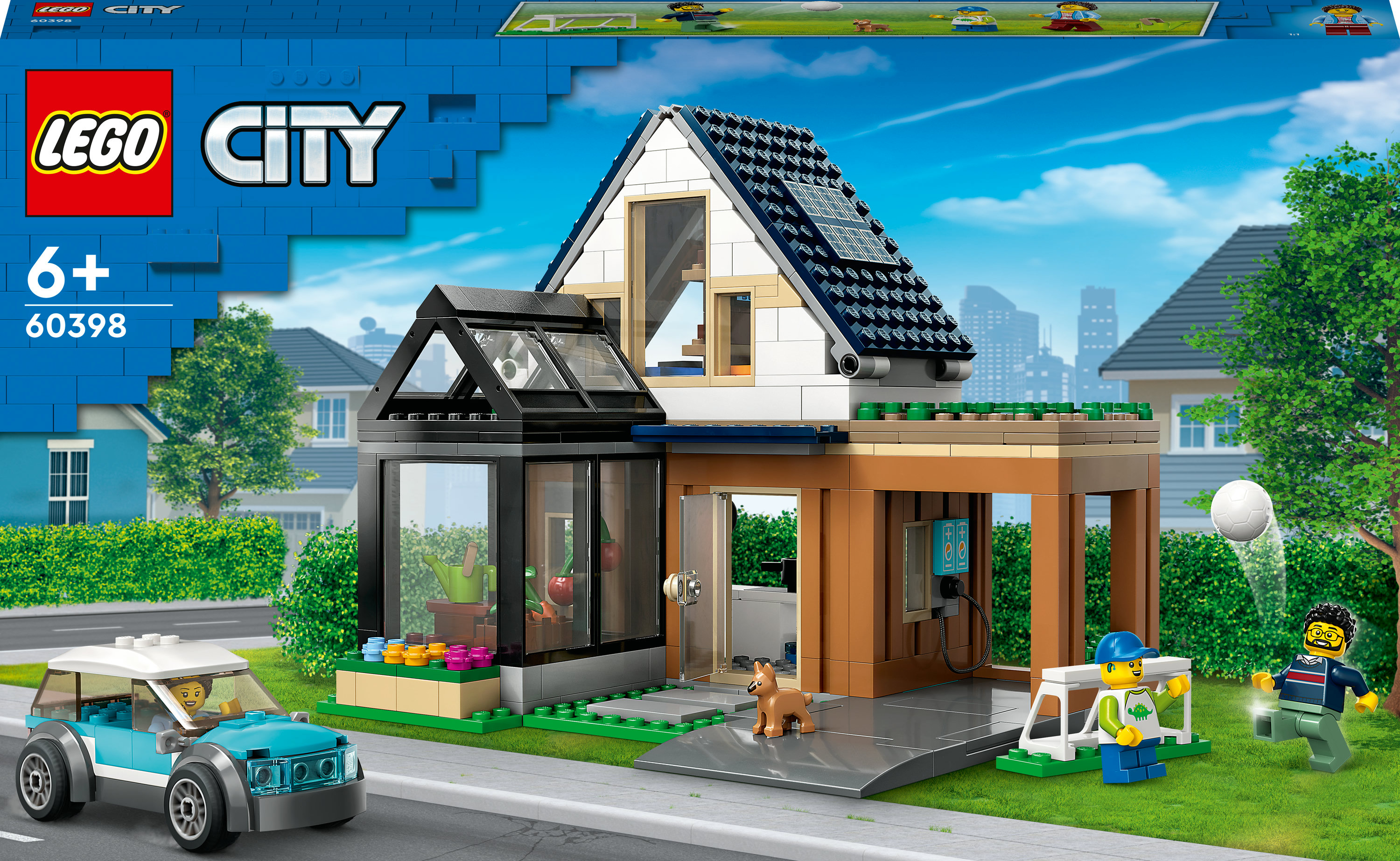 Ein Lego City Set mit einem Haus und Figuren, darunter ein Auto und ein Kind.