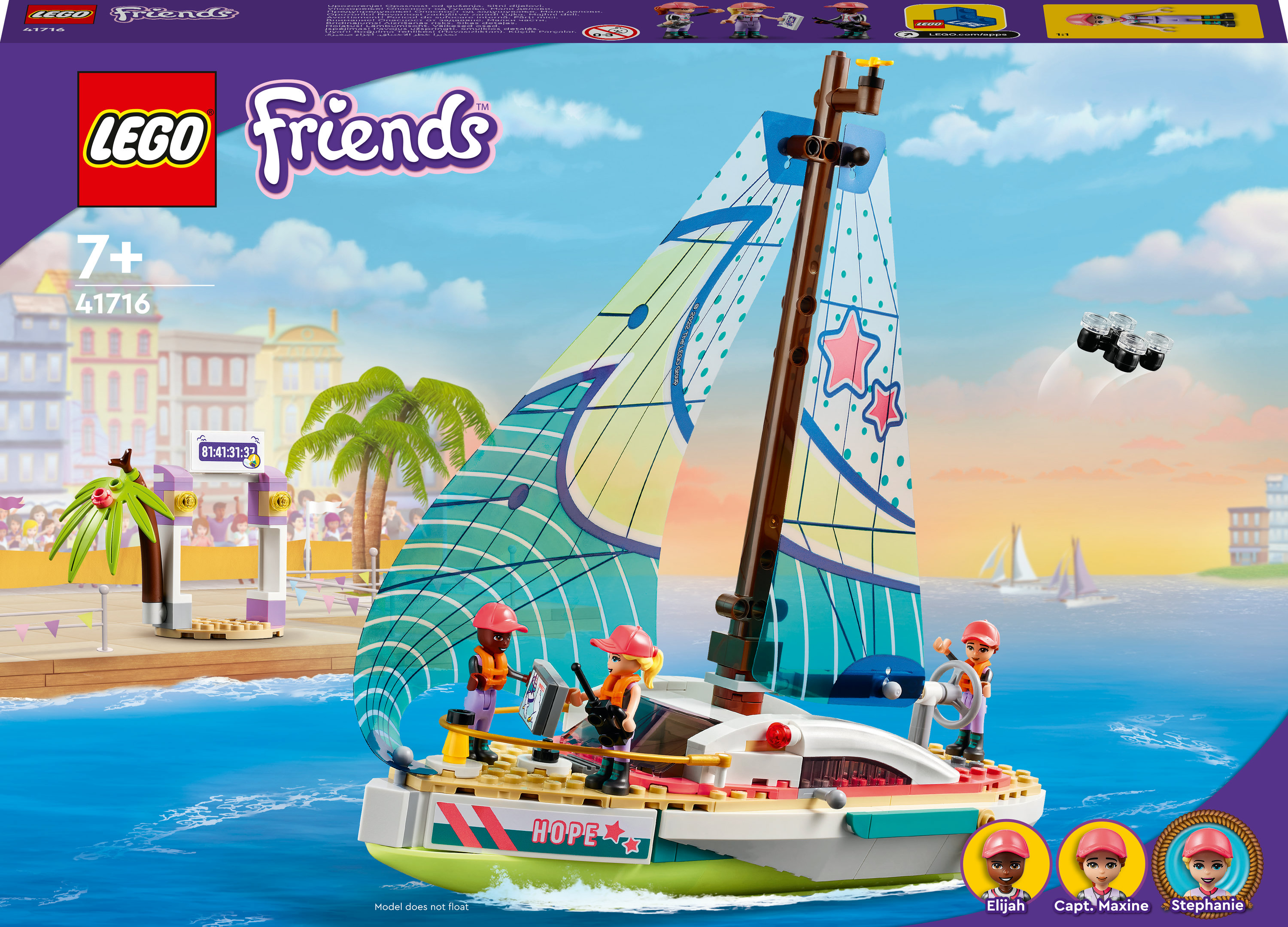 Lego Friends set van een zeilboot met drie figuren aan boord. De achtergrond toont een stad.