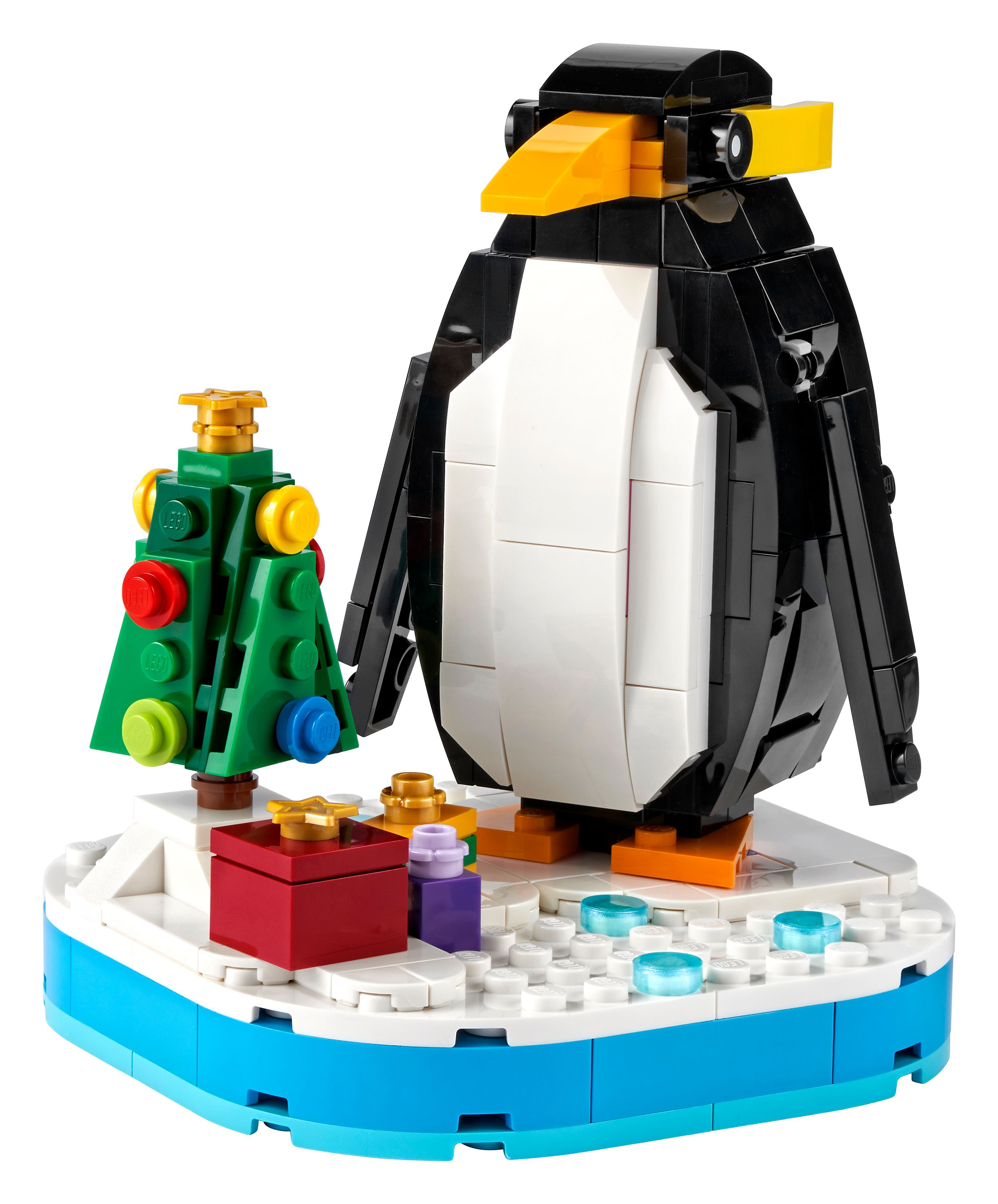 LEGO Pinguin-Set. Ein großer Pinguin mit Weihnachtsbaum, Geschenken und Schnee.