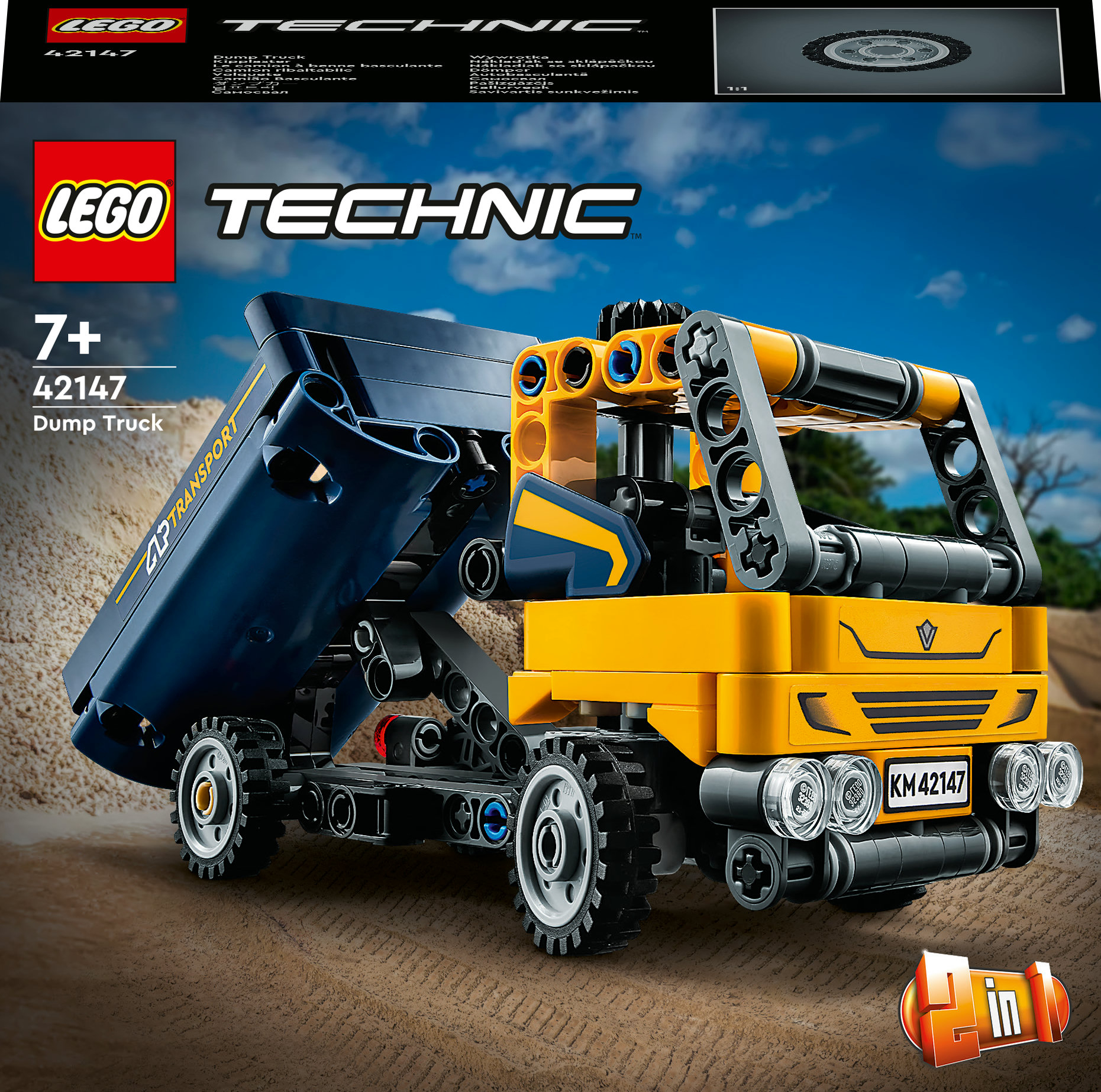 Un juego de camión volquete Lego Technic, cabina amarilla, caja azul y la caja.