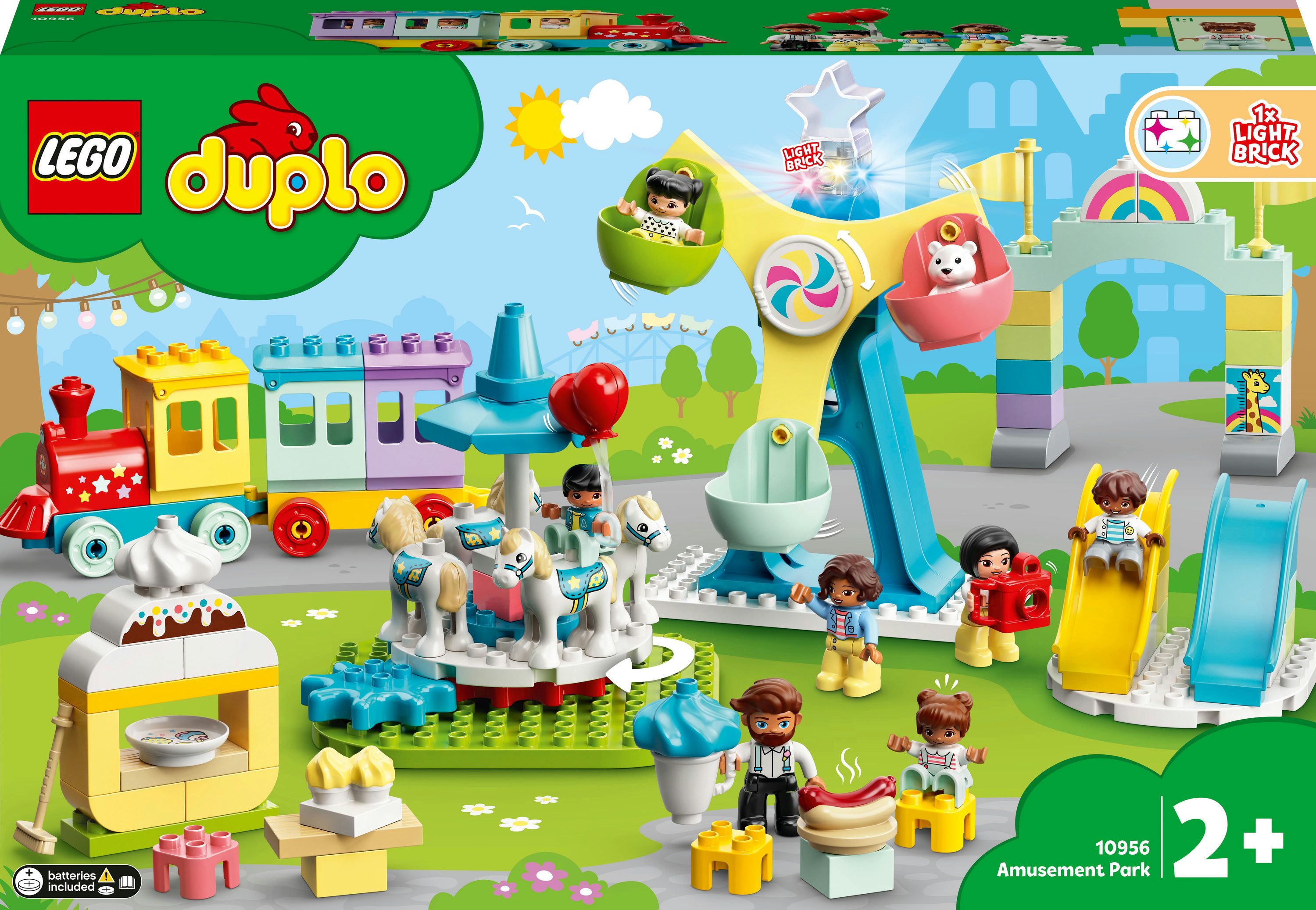 LEGO Duplo Jahrmarkt-Set mit Riesenrad, Karussell und Figuren. Die Szene hat helle, farbenfrohe Elemente.