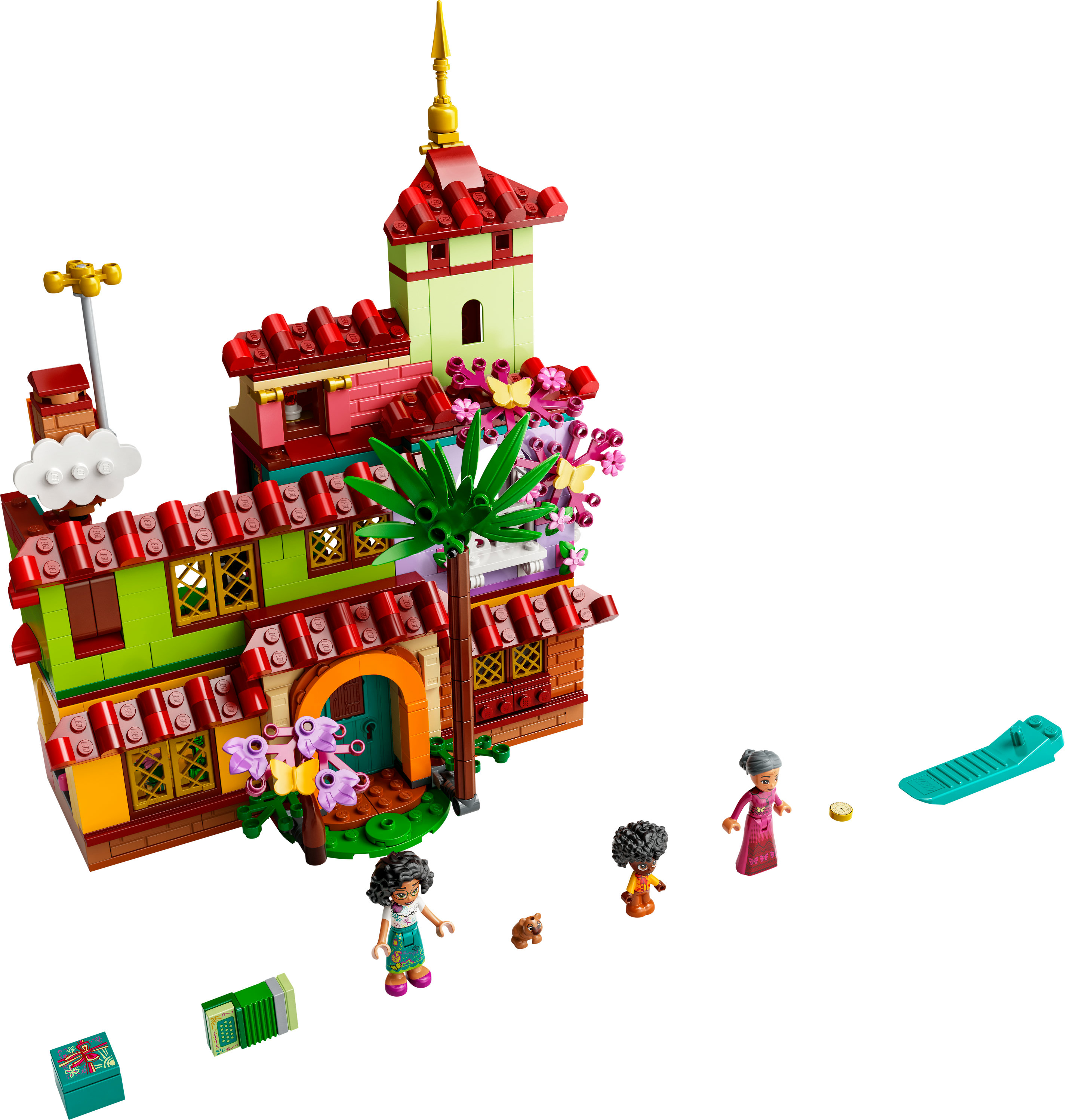Lego-Set eines bunten Gebäudes mit Figuren, darunter ein Haus, Figuren und ein kleiner Hund.