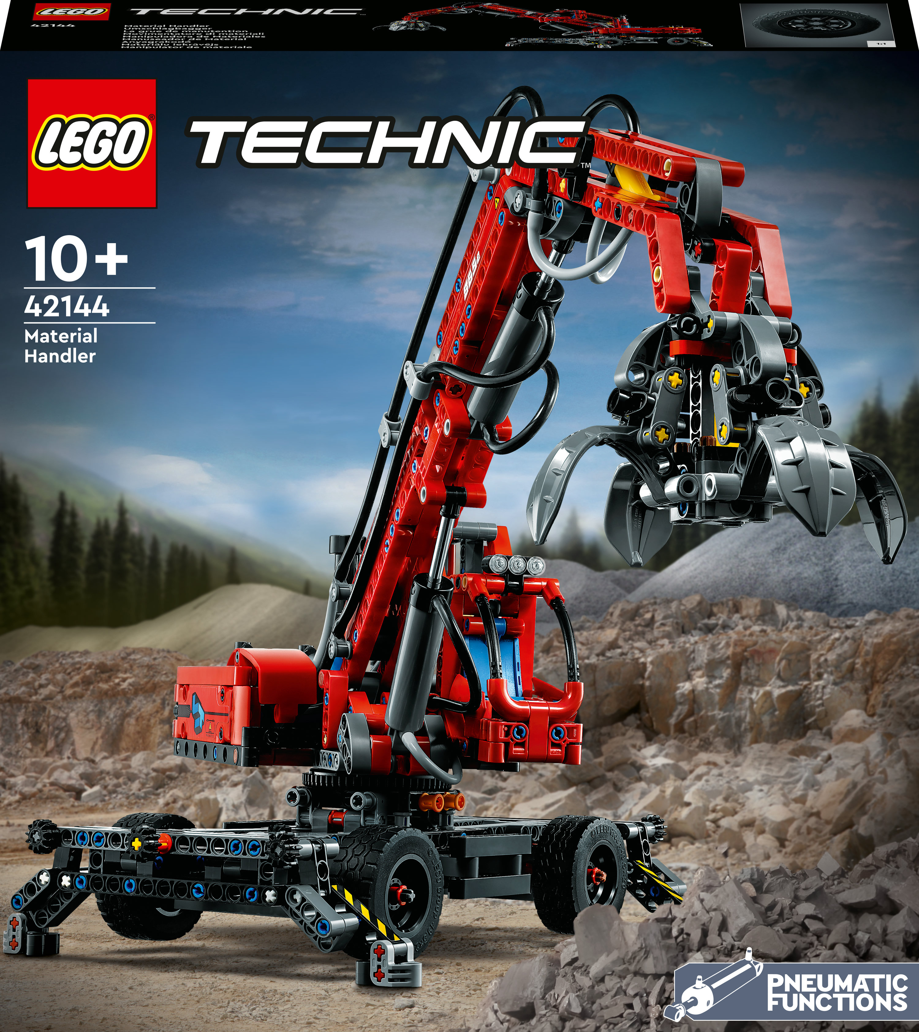 Roter Lego Technic Materialumschlag-Spielzeug auf Felsen.