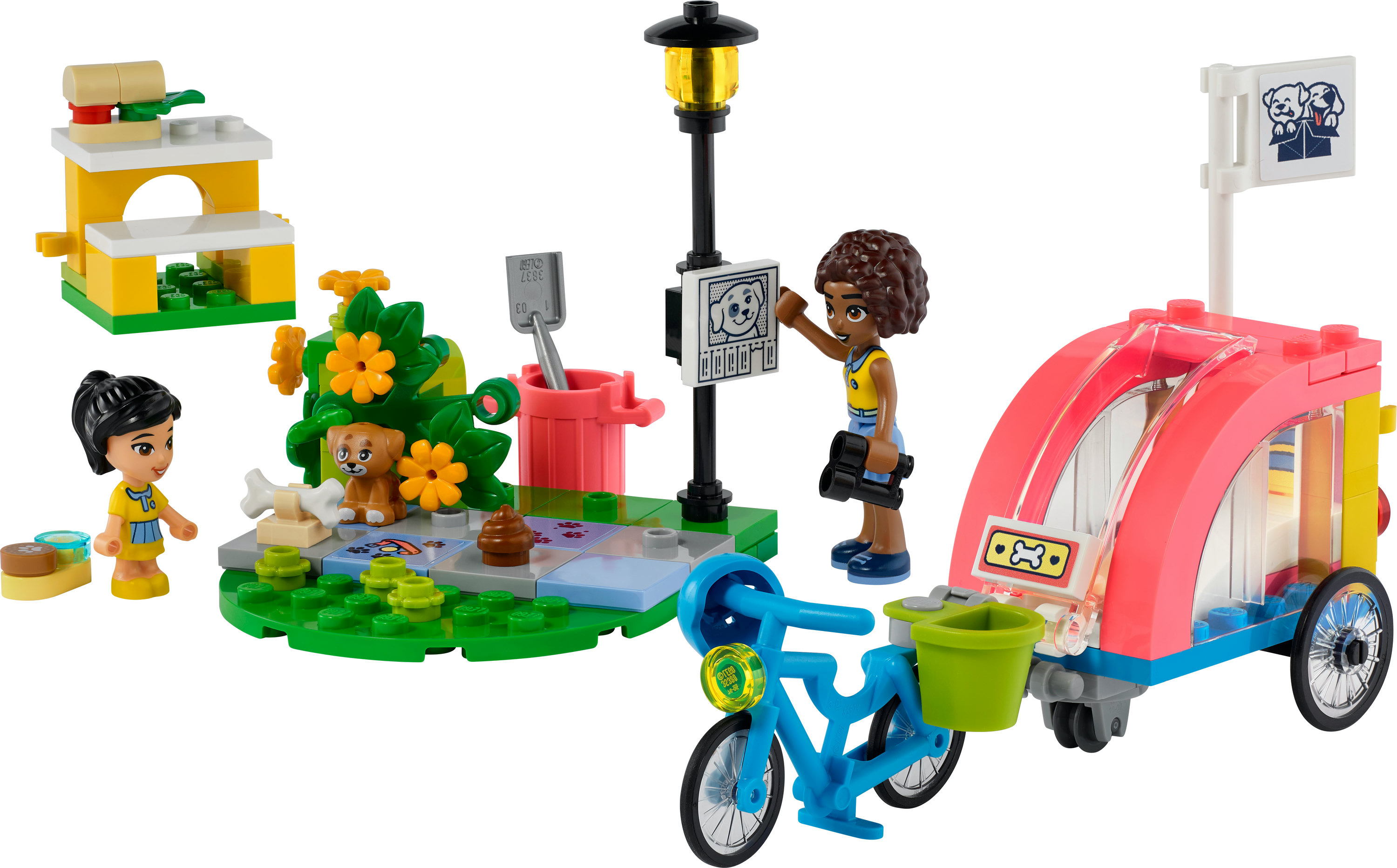 Lego Friends seti: figürler, köpek, bisiklet ve aksesuarlarla park sahnesi. Renkli ve eğlenceli.