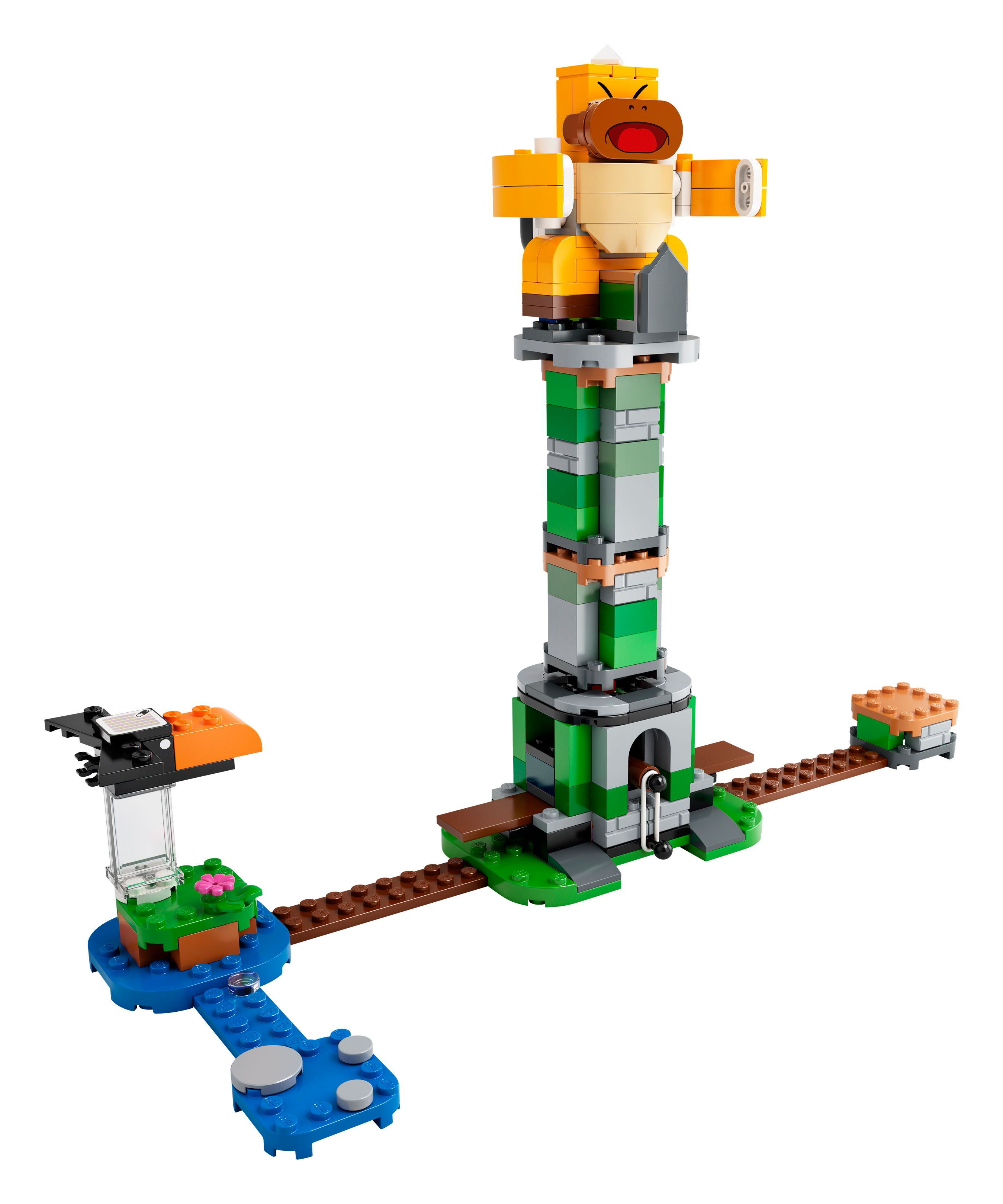 Lego set van een toren met een aap erop. Er is een brug en omringende structuren.