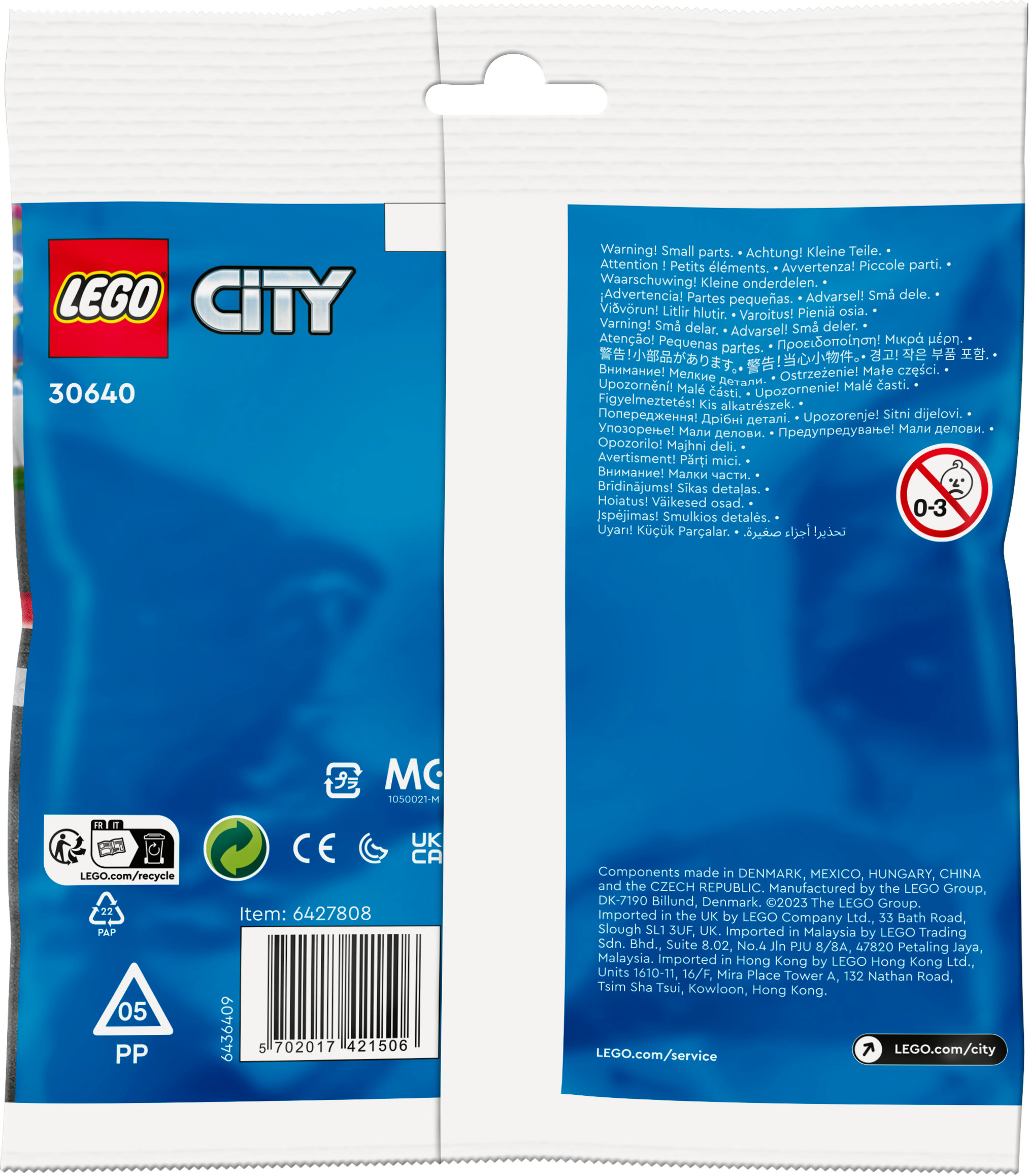 Torebka Lego City. Mała plastikowa torebka z klockami Lego i instrukcjami na odwrocie. Białe tło.