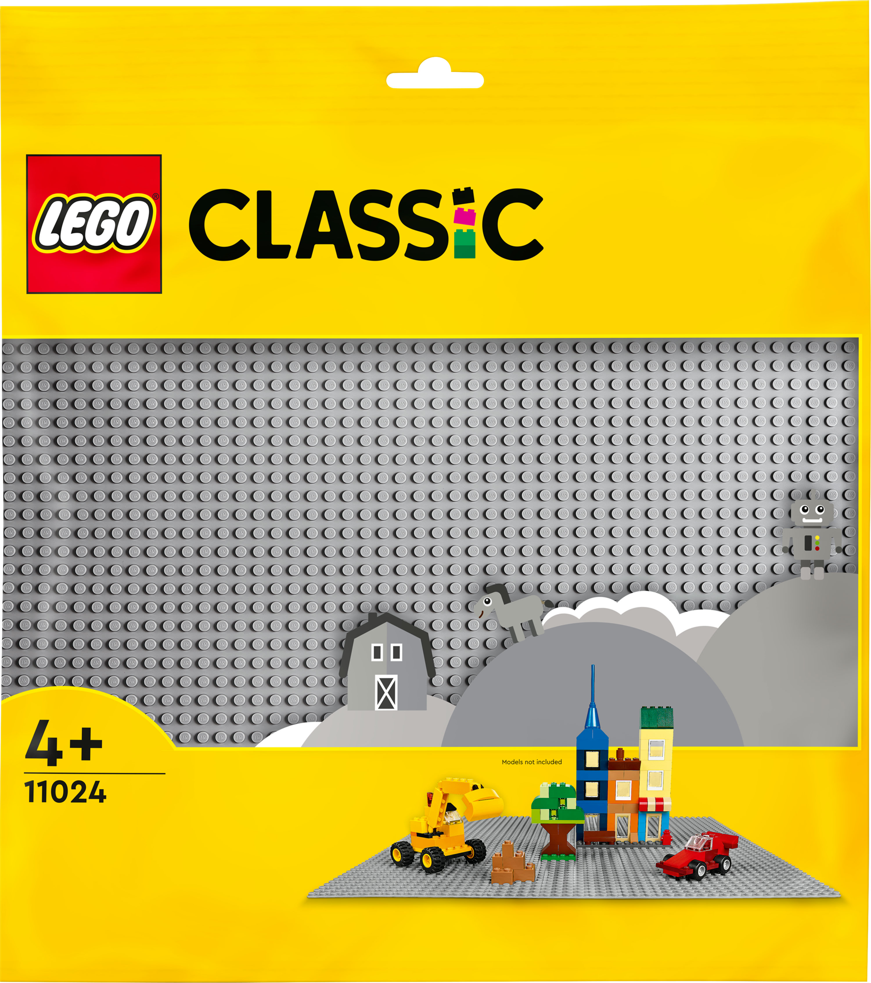 Płytka bazowa Lego Classic z klockami Lego i małą konstrukcją.