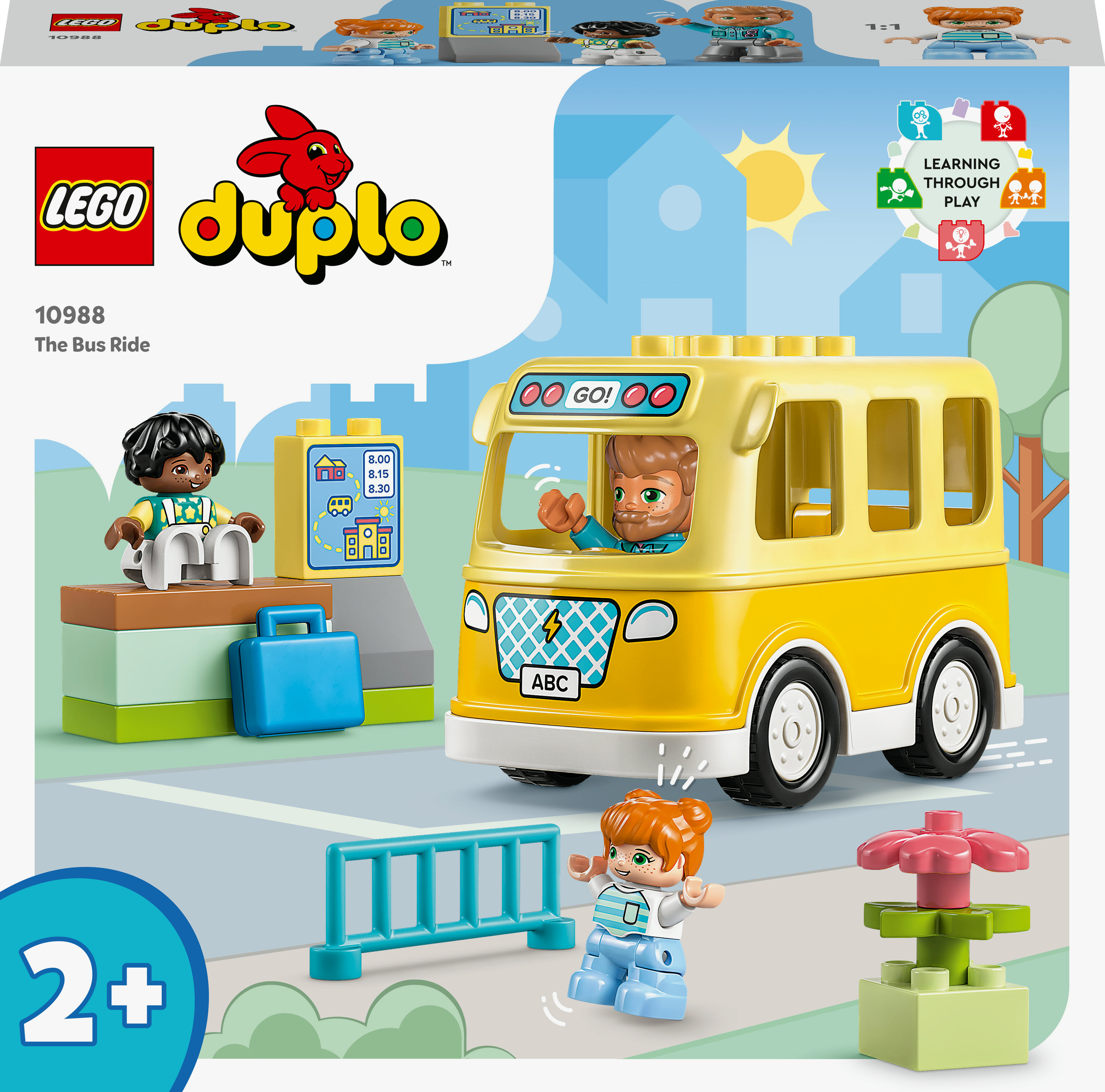 Lego Duplo seti: Figürler ve bir otobüs durağı sahnesi ile sarı otobüs.