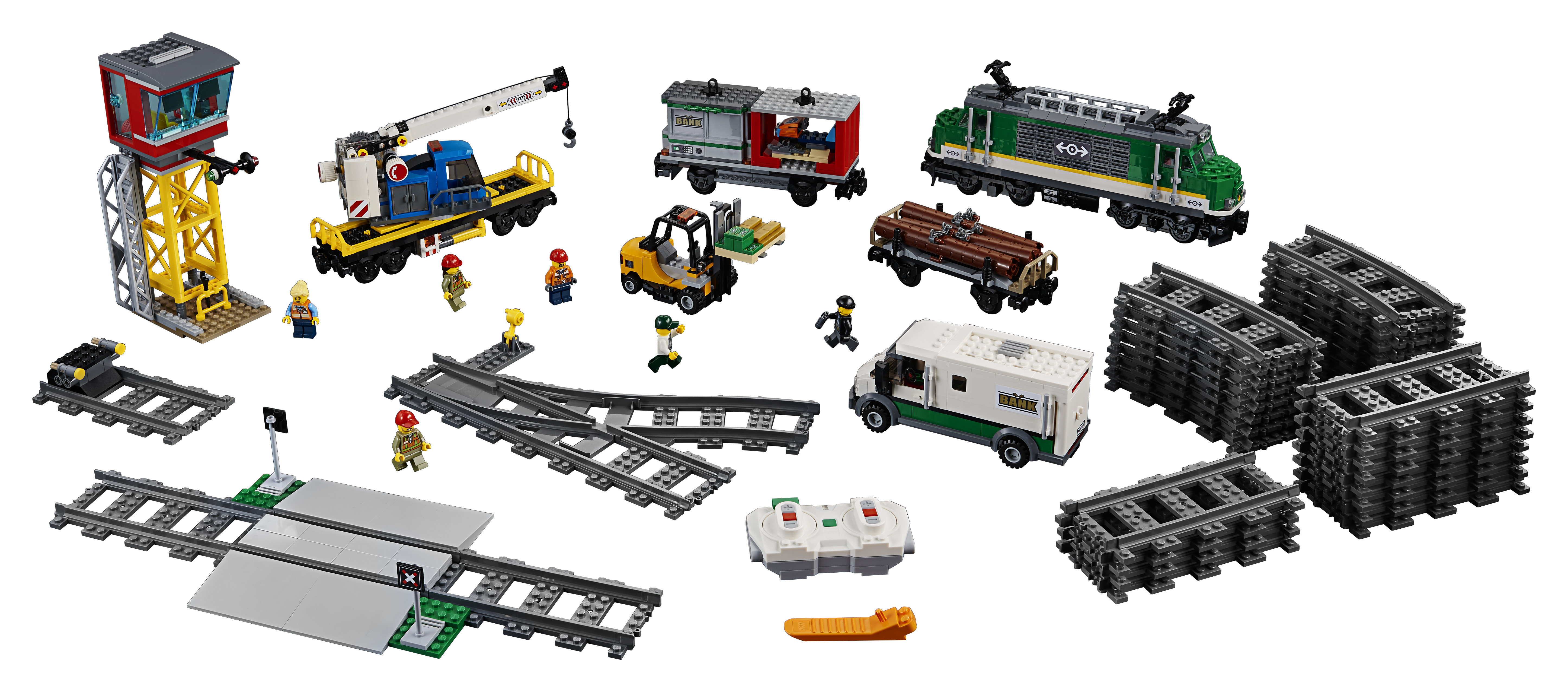 Zestaw Lego City z torem, wagonami, dźwigiem i figurkami. Wszystko na białej powierzchni.
