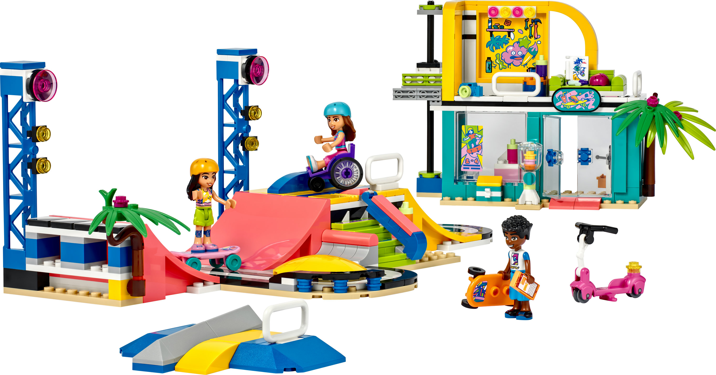 Lego Friends set met een skateparkscène, met figuren op skateboards en in rolstoelen.