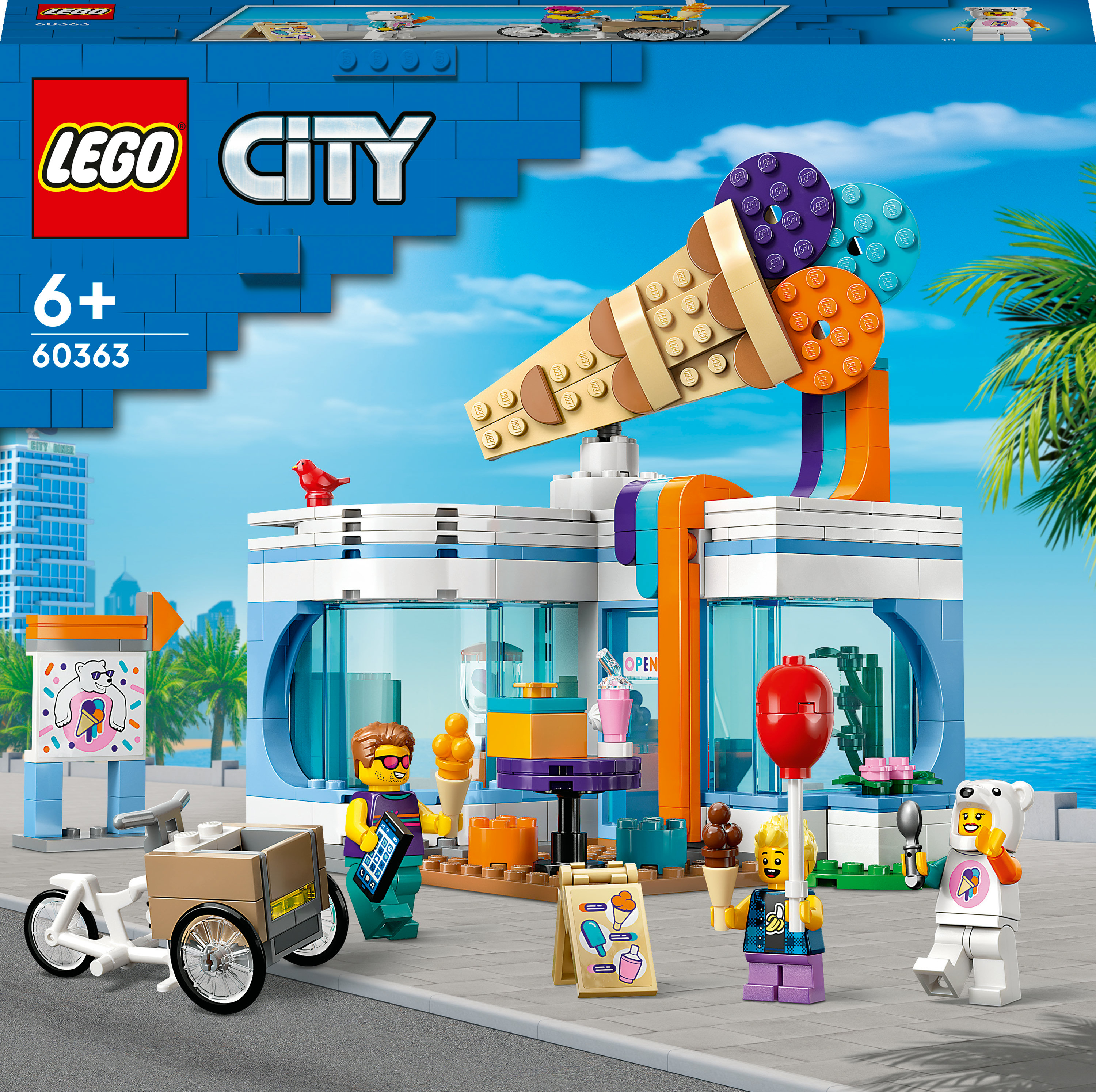 Set negozio di gelati Lego con personaggi, coni gelato e un edificio blu e bianco.
