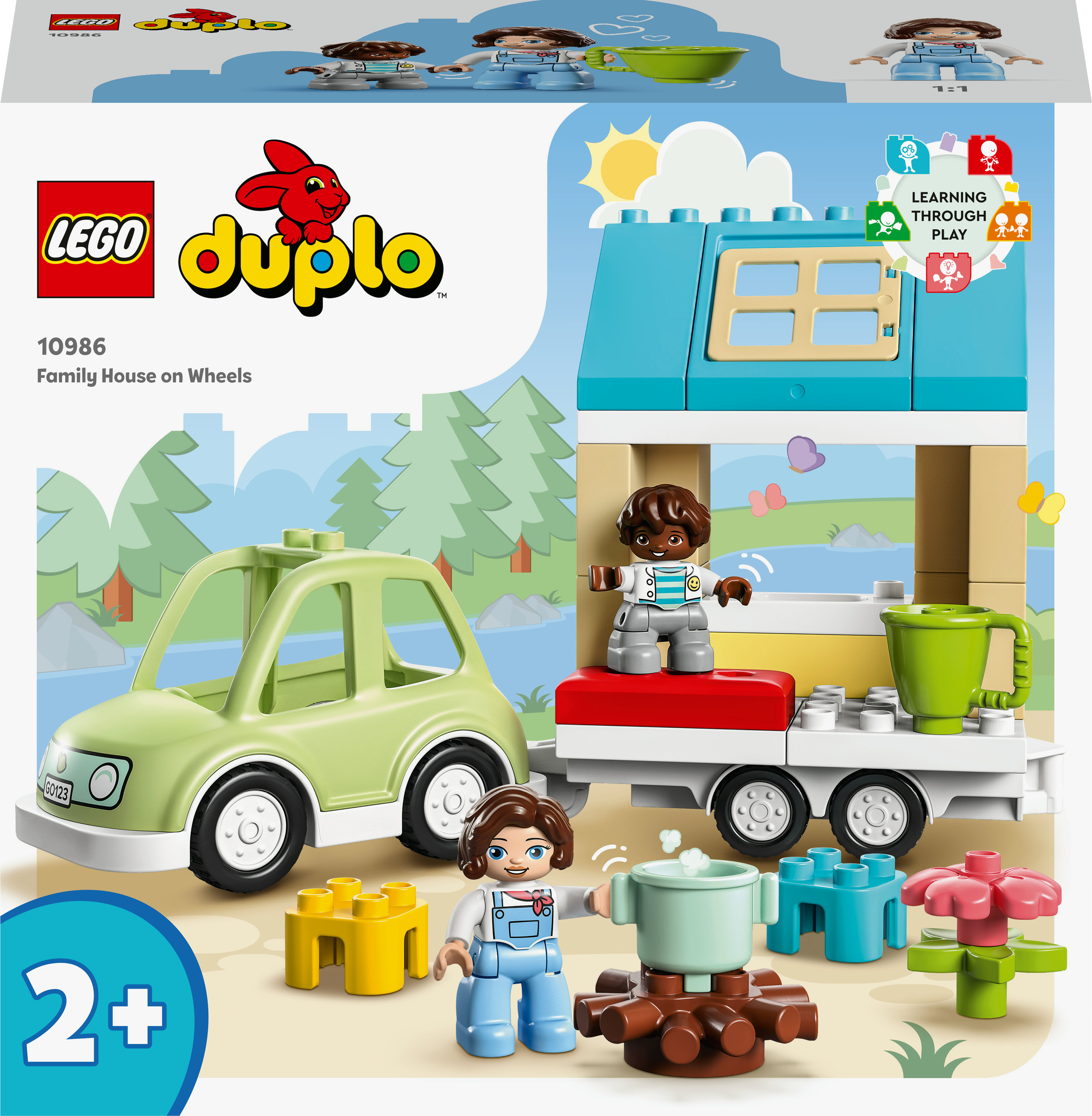 Lego Duplo Familienhaus auf Rädern Set-Box. Enthält Auto, Anhänger, Figuren und Legosteine.
