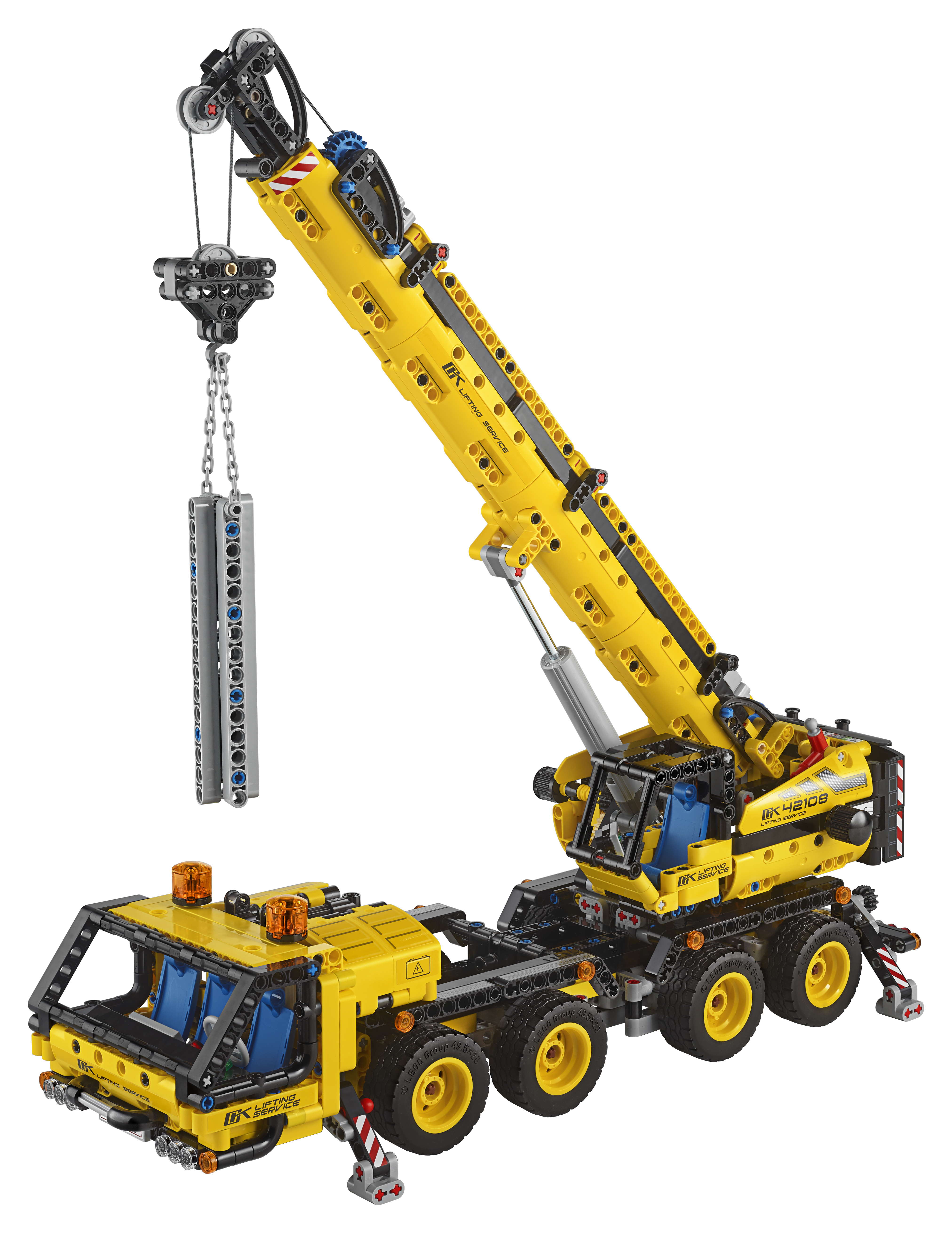 A yellow Lego Technic crane truck lifting something with its hook.