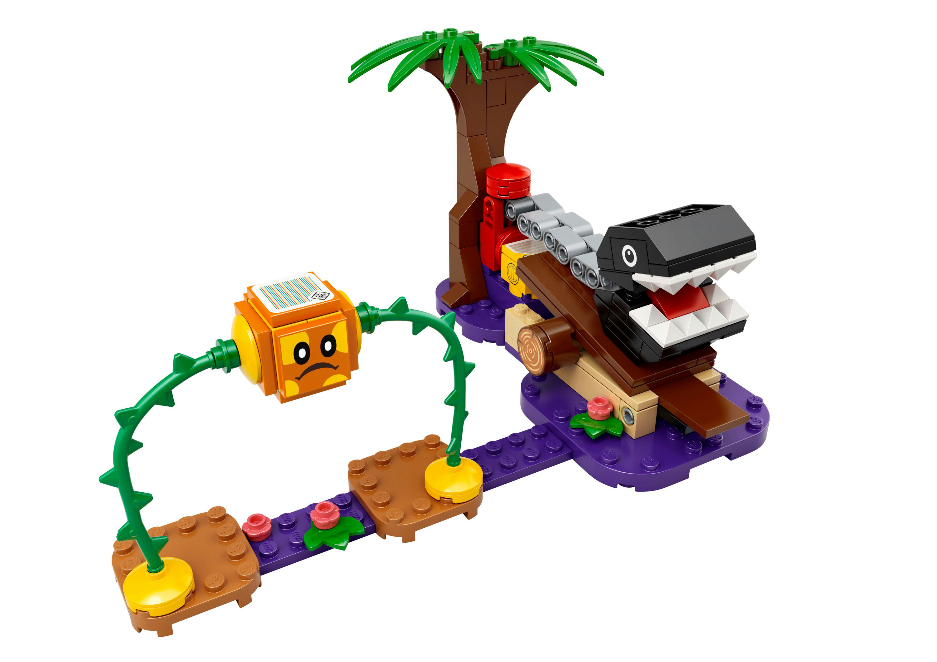 Scena Lego Super Mario con un Chain Chomp, blocco punto interrogativo e palma.
