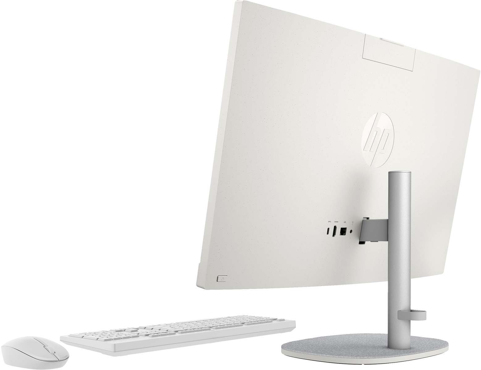 Monitor de computadora HP blanco. Vista trasera con puertos, y teclado y ratón sobre la superficie.