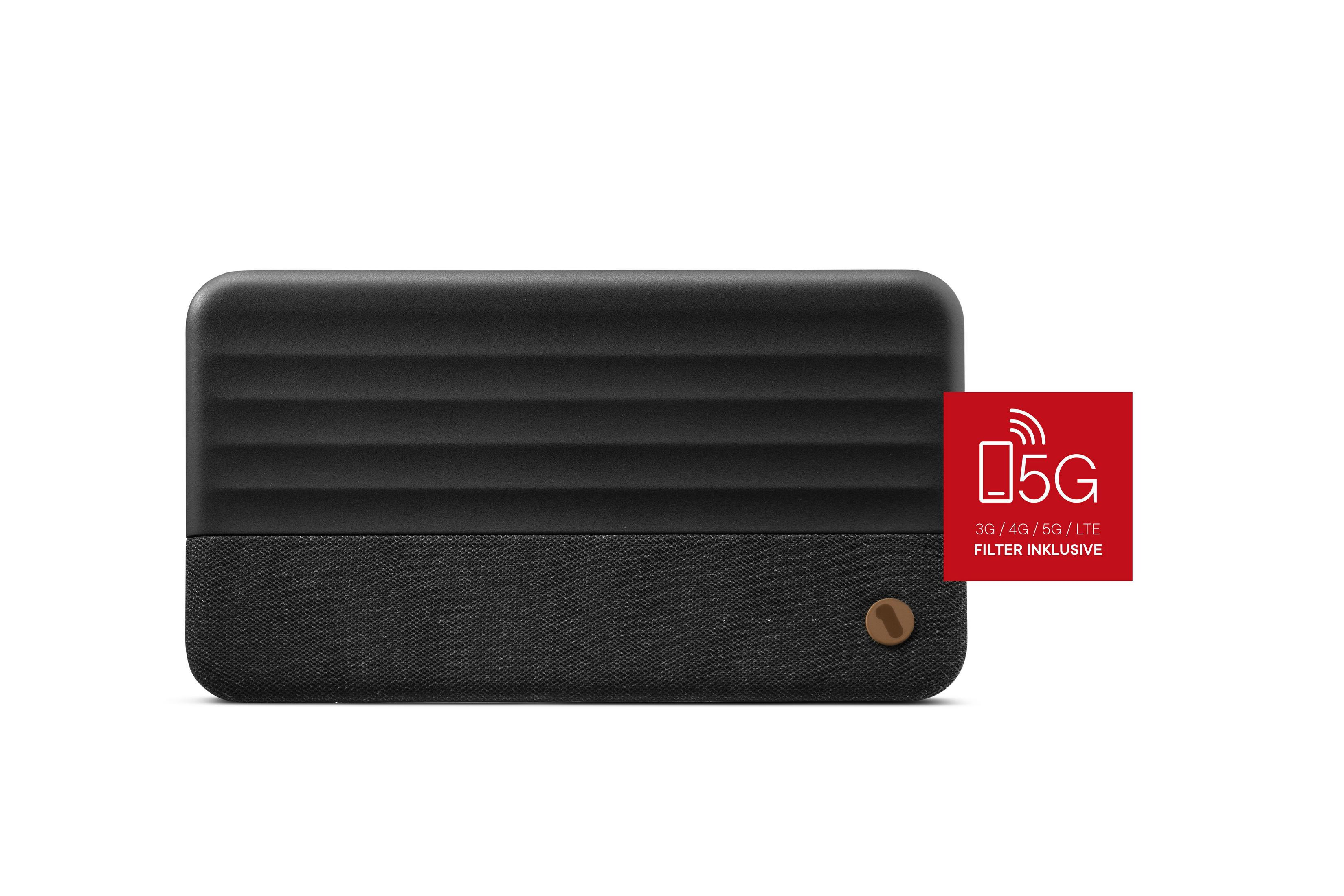 Schwarzes rechteckiges Gerät mit geriffelter Oberseite und Stoffunterseite. Ein rotes 5G-Logo rechts.