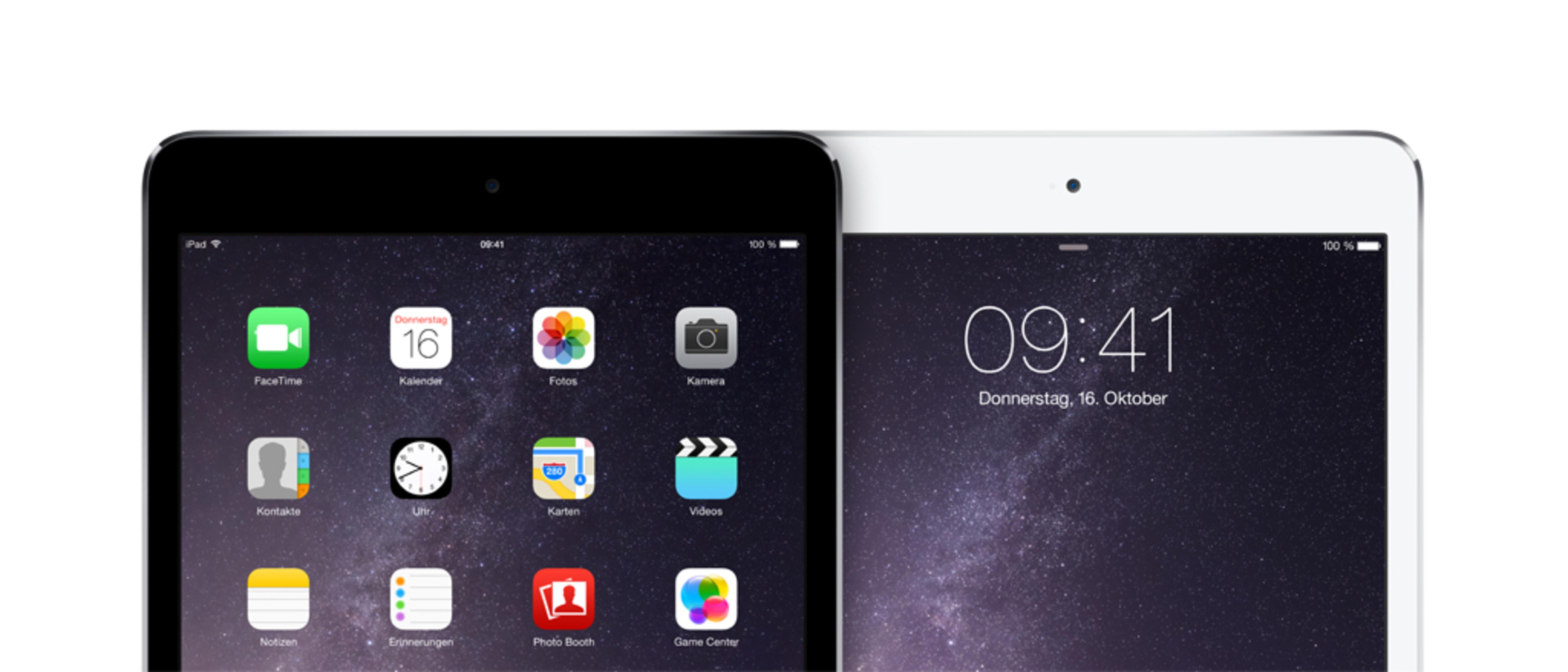 Zwei iPads, eines schwarz und eines weiß, zeigen den iOS-Startbildschirm.
