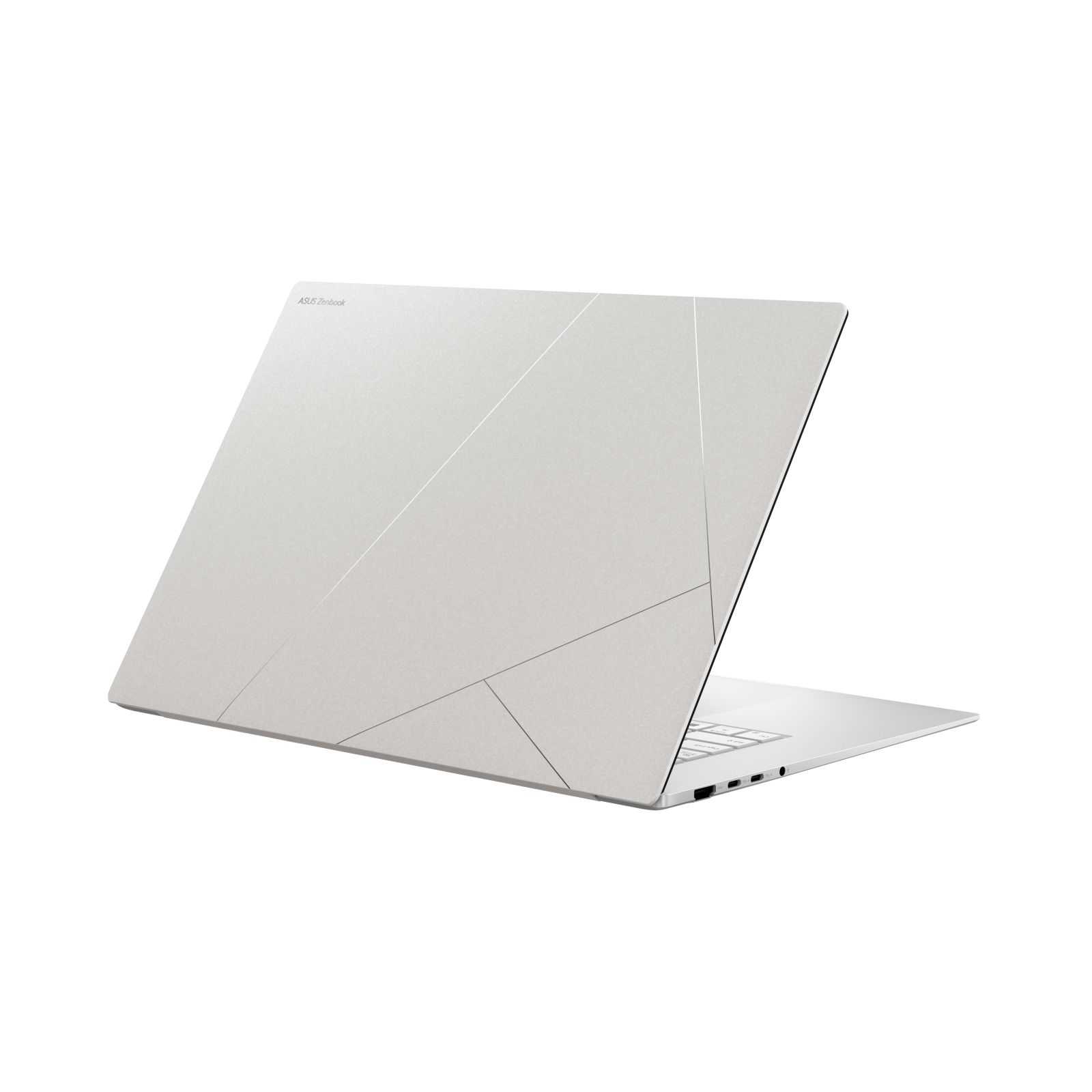 Ein Laptop, dessen Rückseite zur Kamera zeigt. Der Laptop ist silberfarben und trägt die Aufschrift Asus.