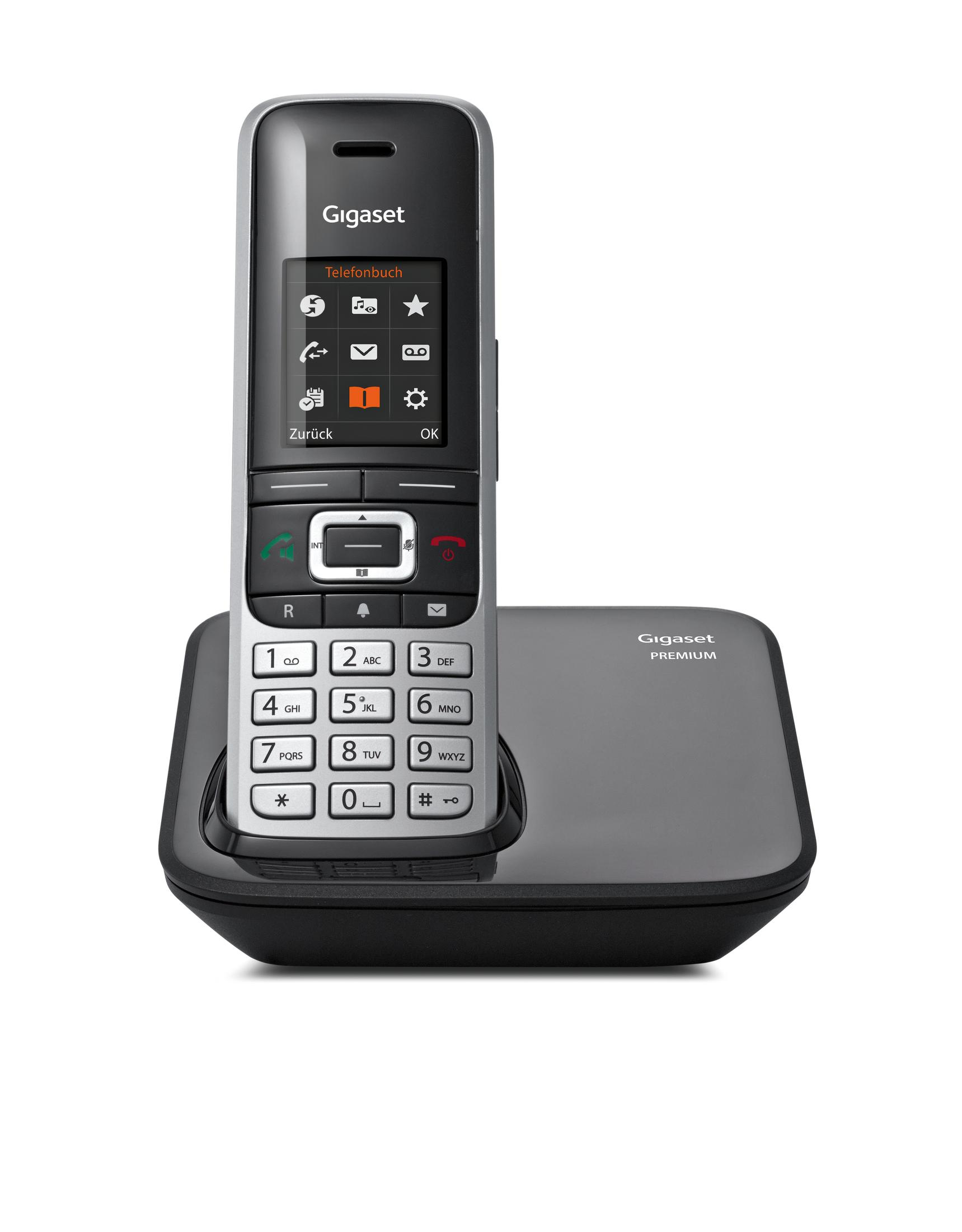 Un telefono cordless Gigaset nero su una base di ricarica nera.