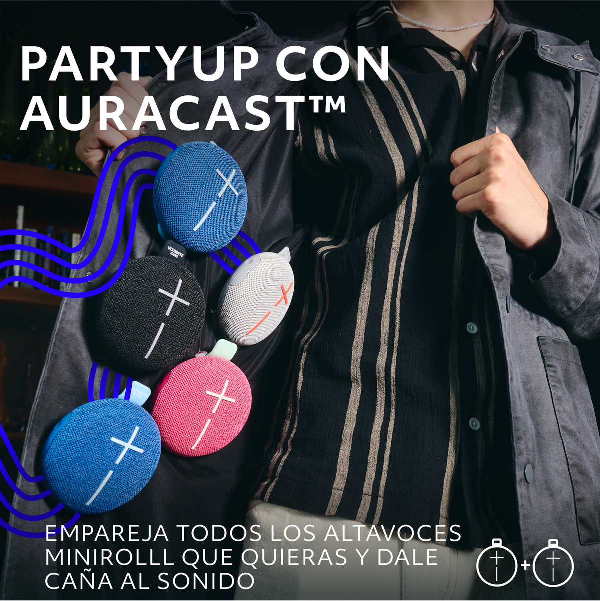 Mężczyzna w kurtce, kilka małych głośników i tekst: PARTYUP CON AURACAST.