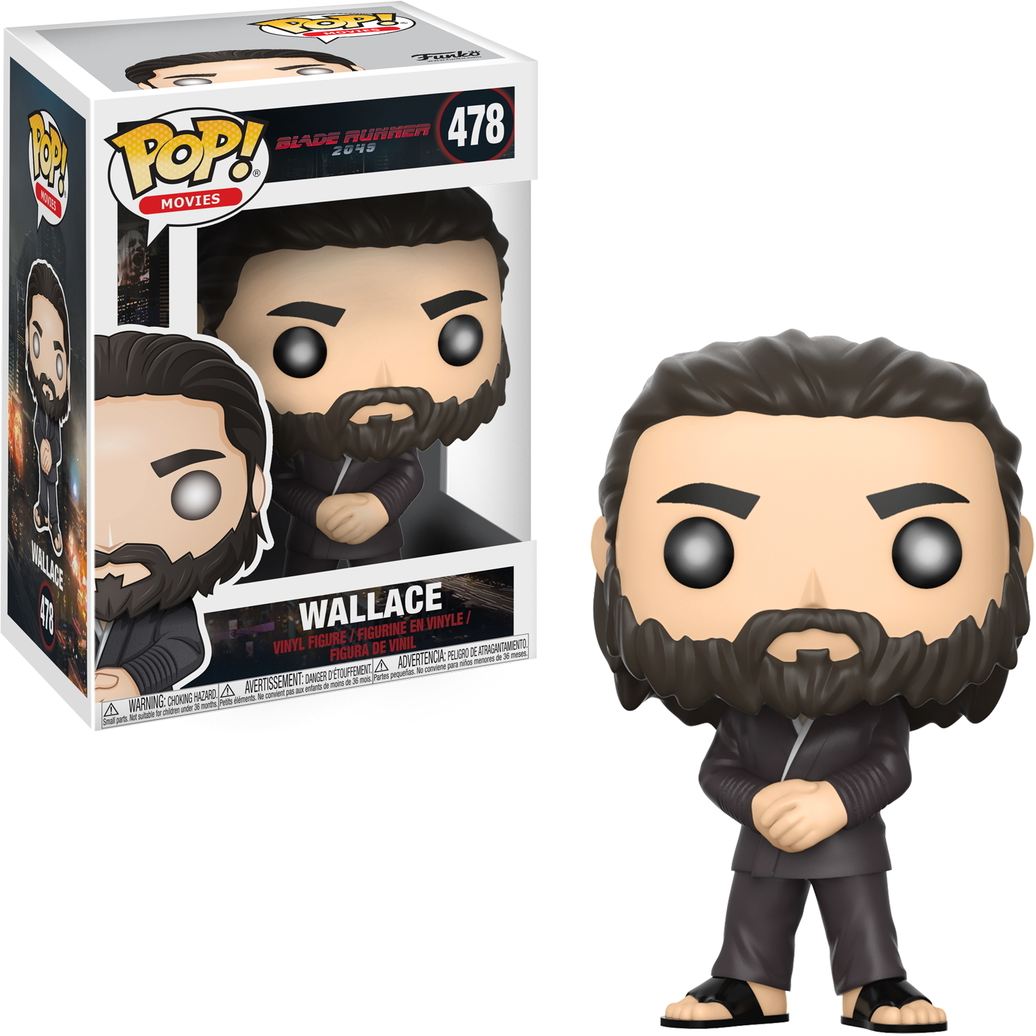 Eine Wallace Funko Pop Figur. Sie ist in einer Box. Die Figur hat einen Bart und trägt einen dunklen Anzug und Sandalen. Die Box hat Text.