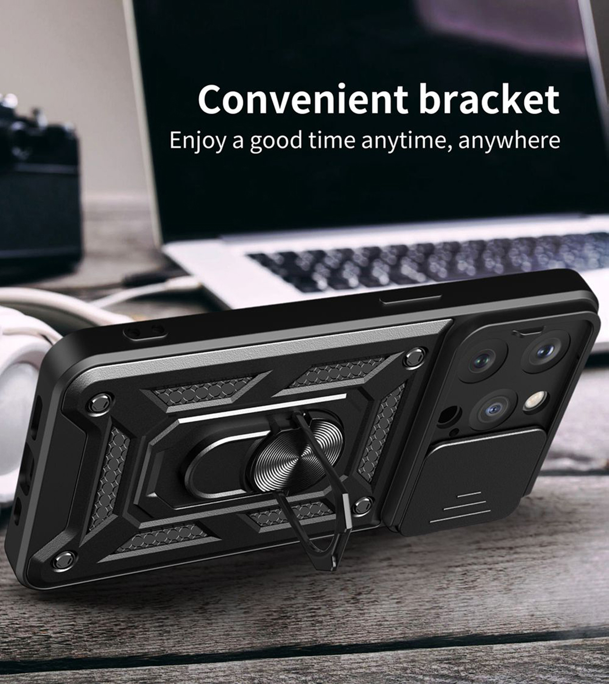 Zwarte telefoonhoes met ringhouder en schuifbare camera cover. Achtergrond is een laptop.
