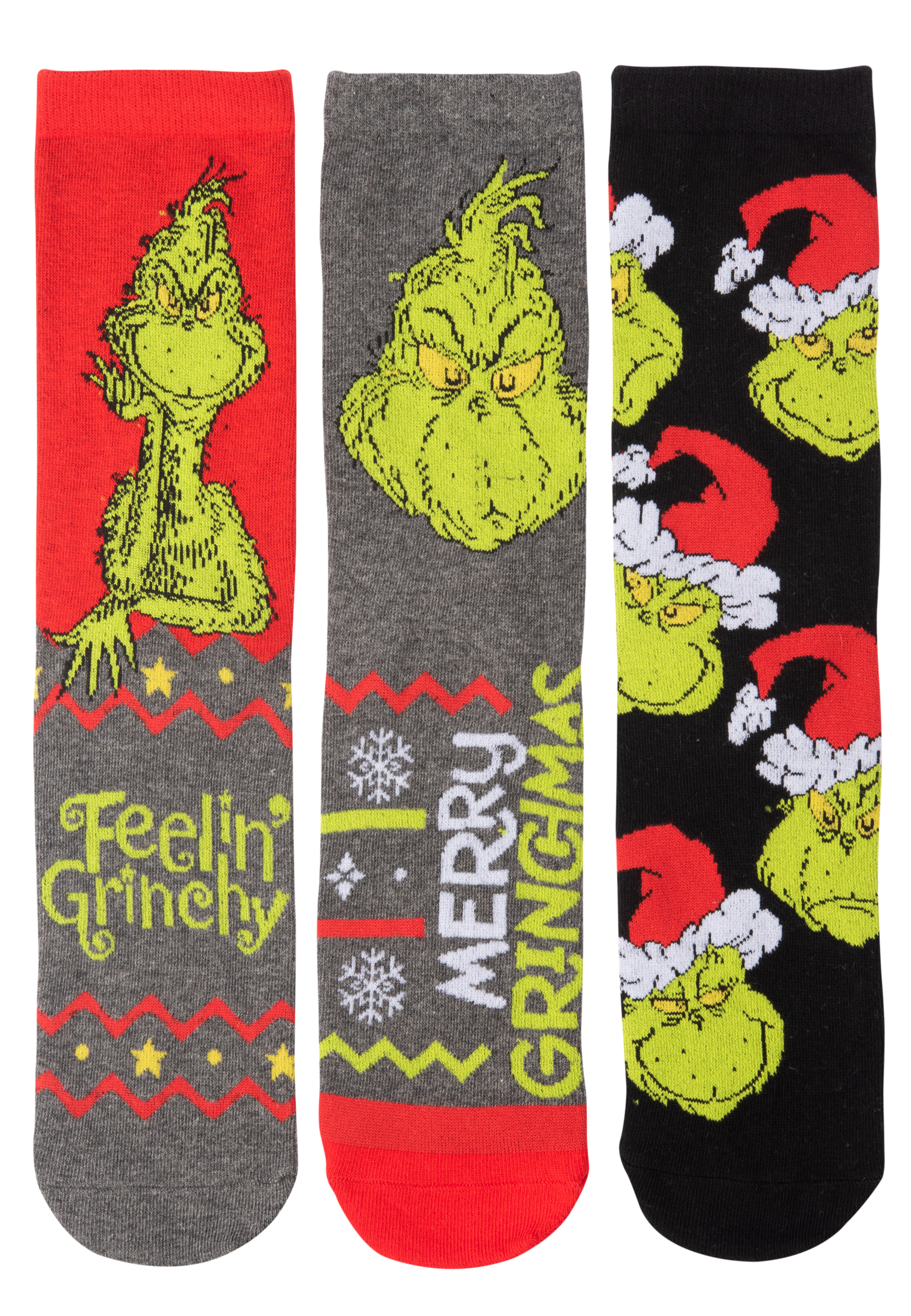 Drei Paar Socken im Grinch-Design mit verschiedenen Mustern.