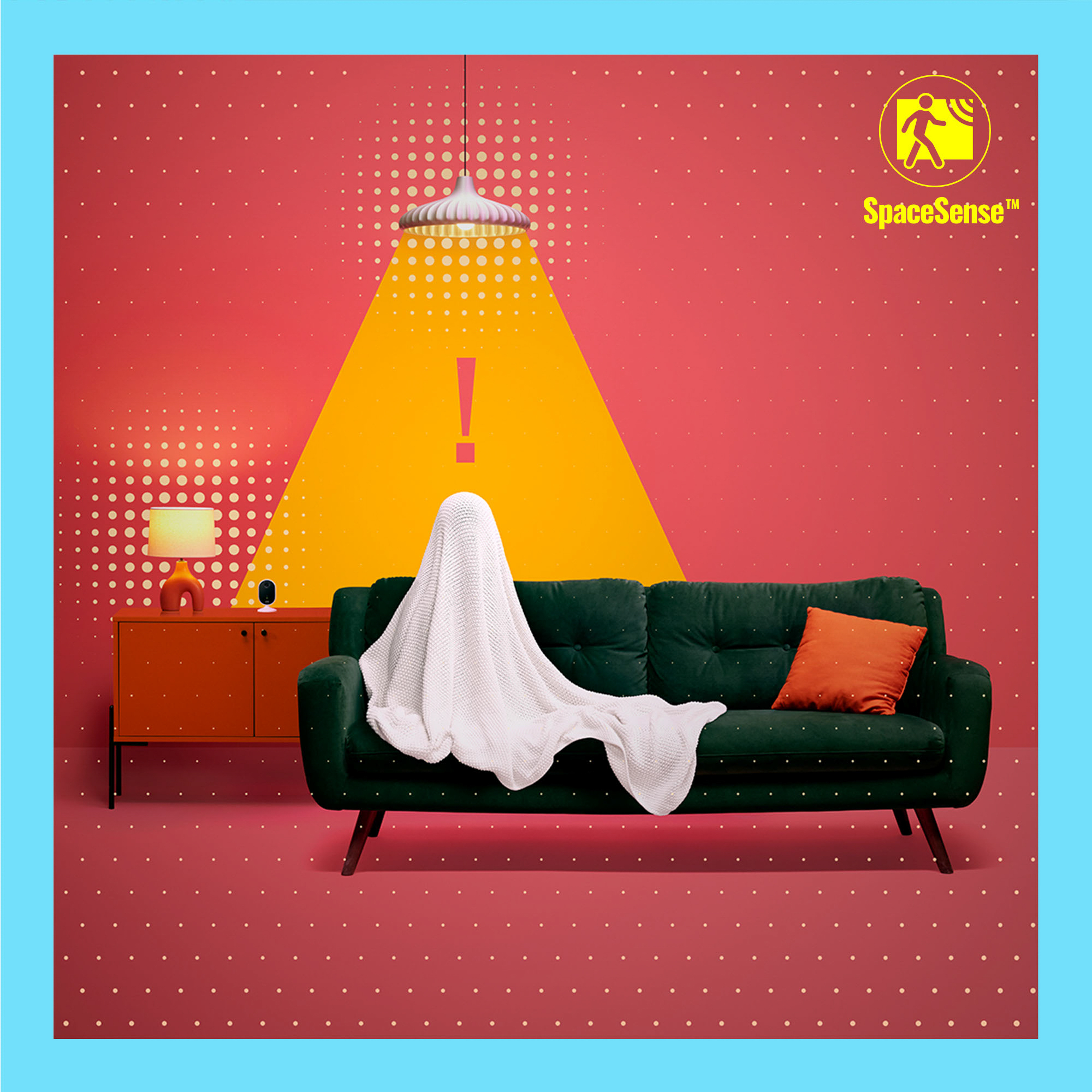 Interior scene with a green sofa, orange cabinet, and a white sheet shaped like a ghost.
