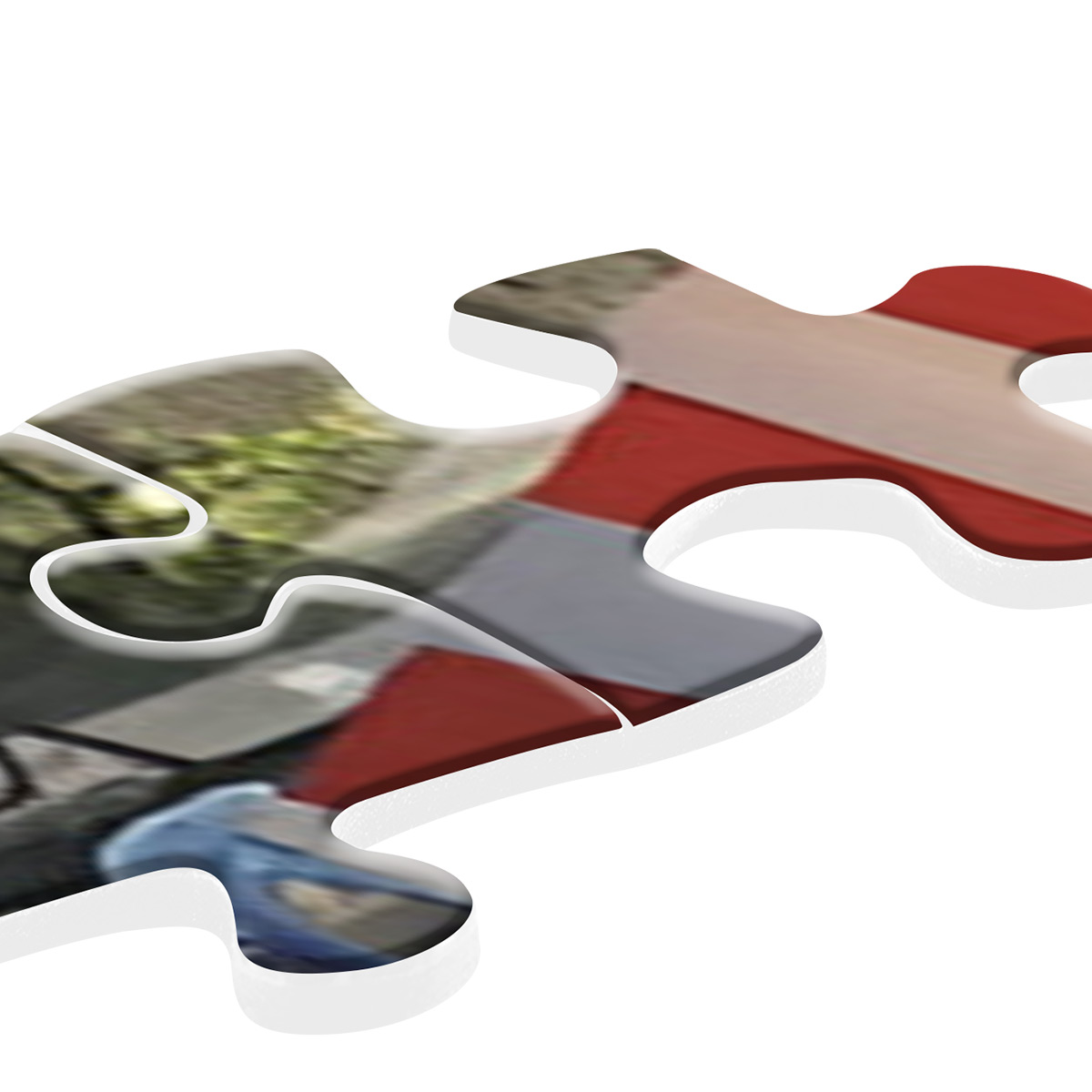 Elementy układanki, dwa, z bliskim widokiem abstrakcyjnego obrazu. Kolory czerwony, biały i niebieski.