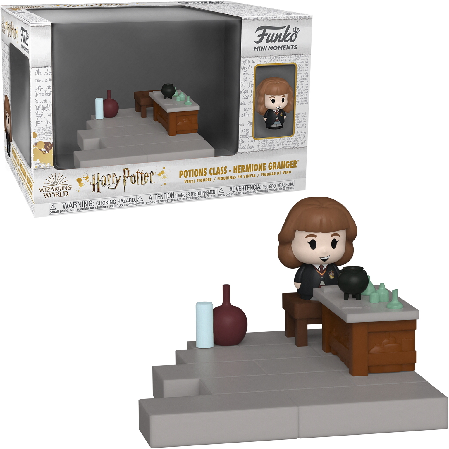 Figurka Funko Pop Hermiony Granger w dioramie klasy eliksirów, z butelkami i stołem.