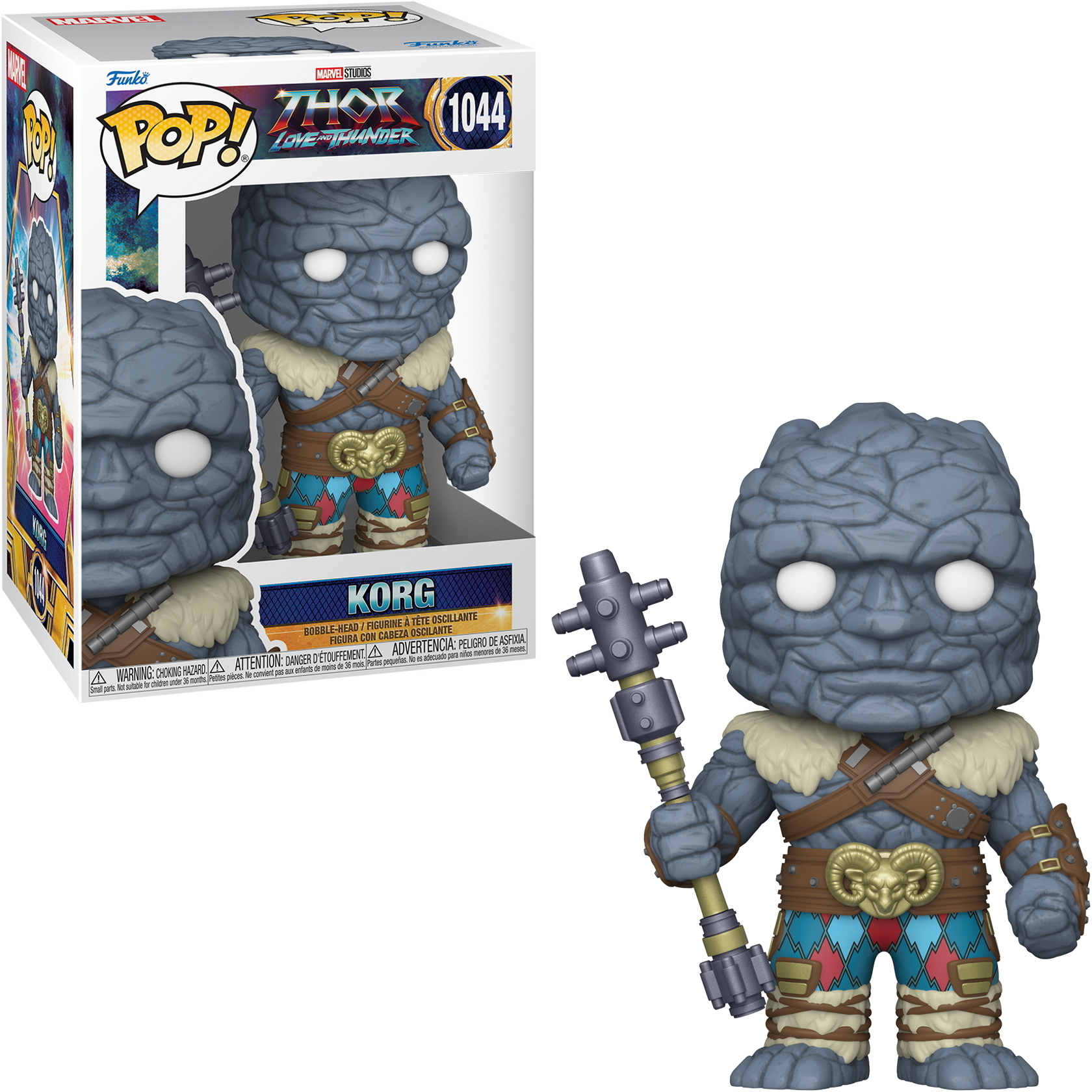 Una figura di Korg Pop! in una scatola e fuori dalla scatola, con un'arma a forma di martello. La scatola mostra il volto.