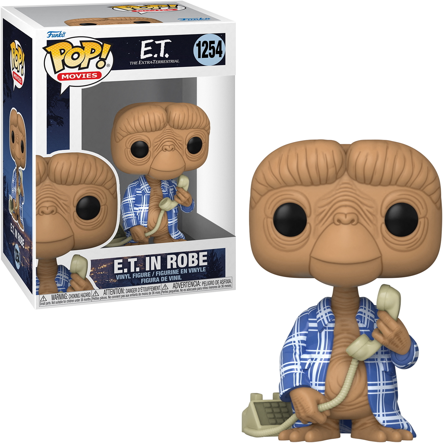 Statuetta di E.T. in accappatoio con telefono. La figura ha un viso marrone e un accappatoio blu. C'è una scatola.