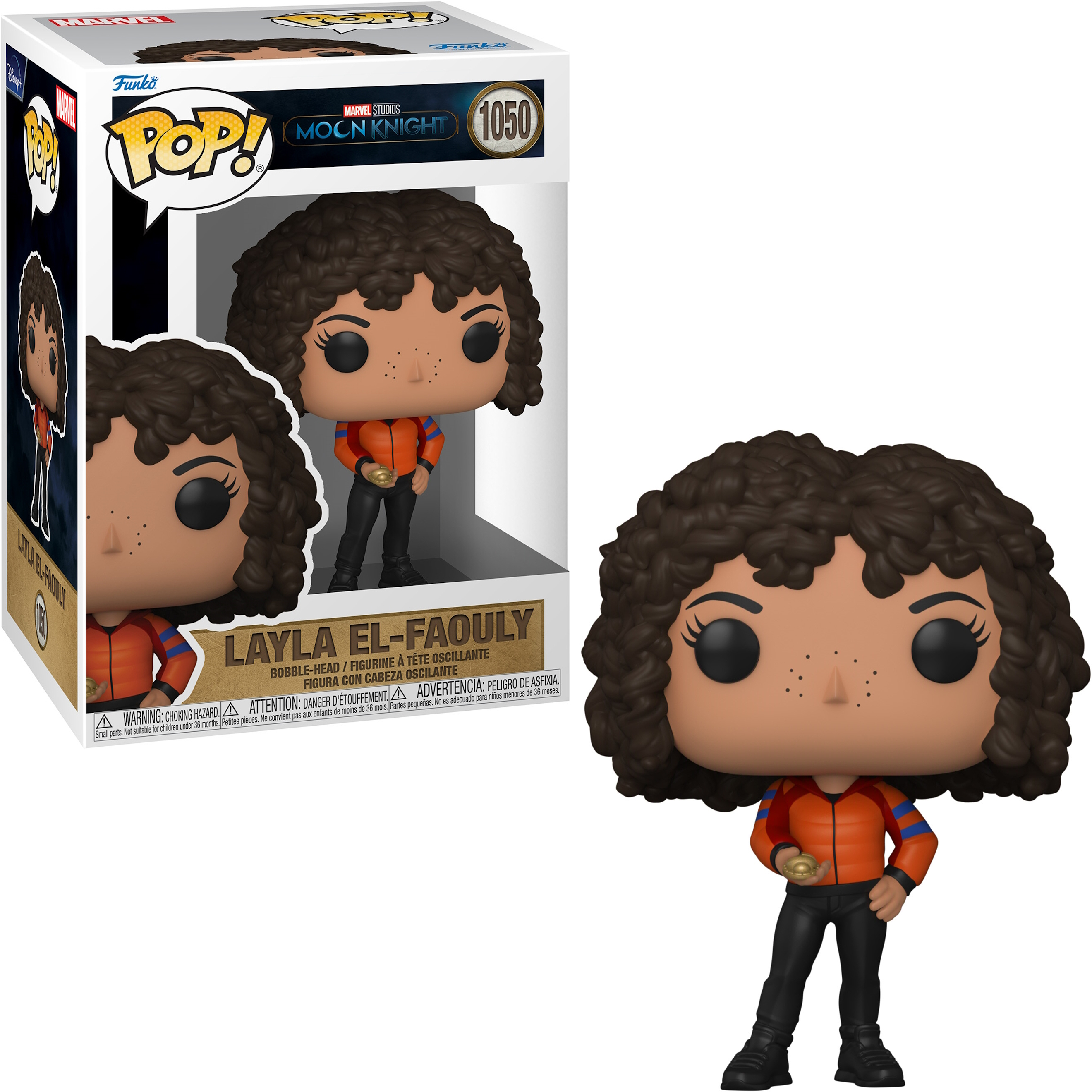 Figura Layla El-Faouly Funko Pop davanti alla sua scatola. Indossa una giacca arancione e pantaloni neri.