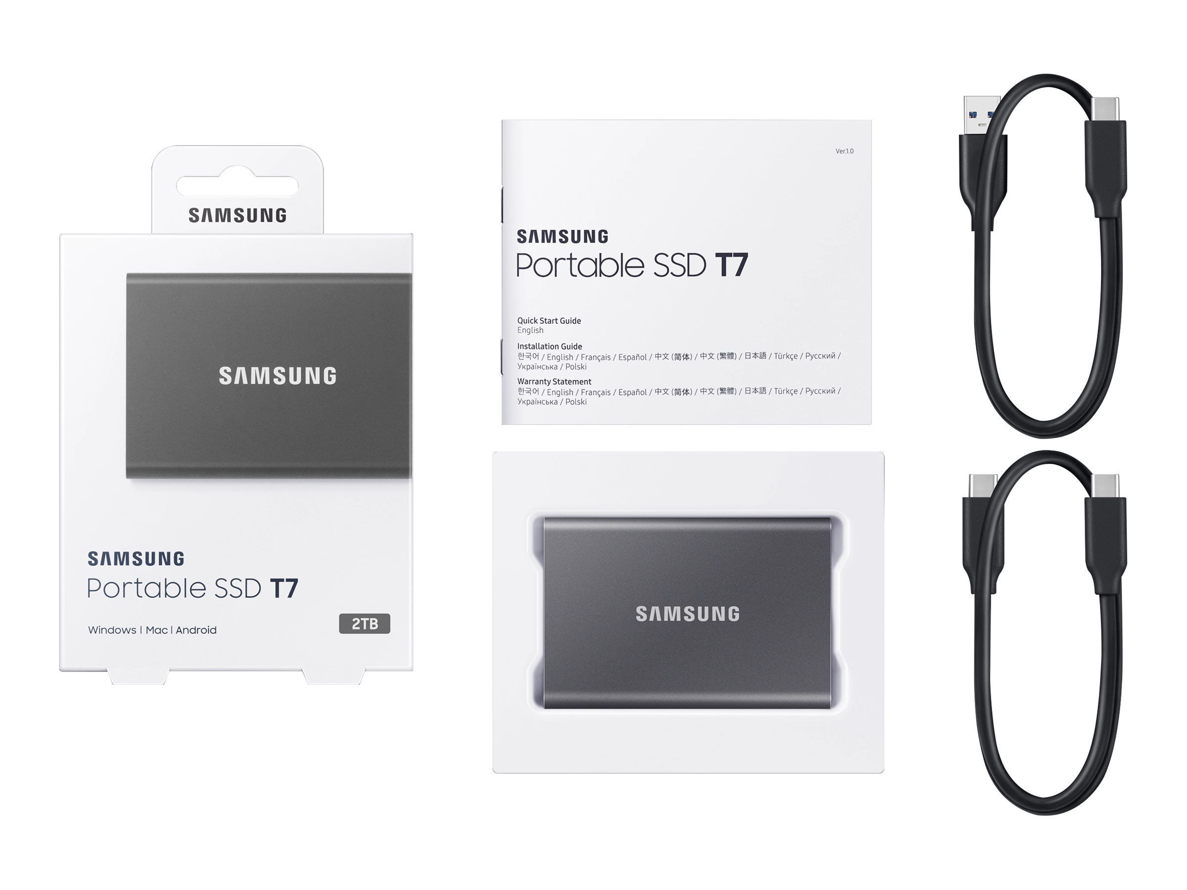 Eine Samsung Portable SSD T7 mit Laufwerk, Kabeln und Verpackung.