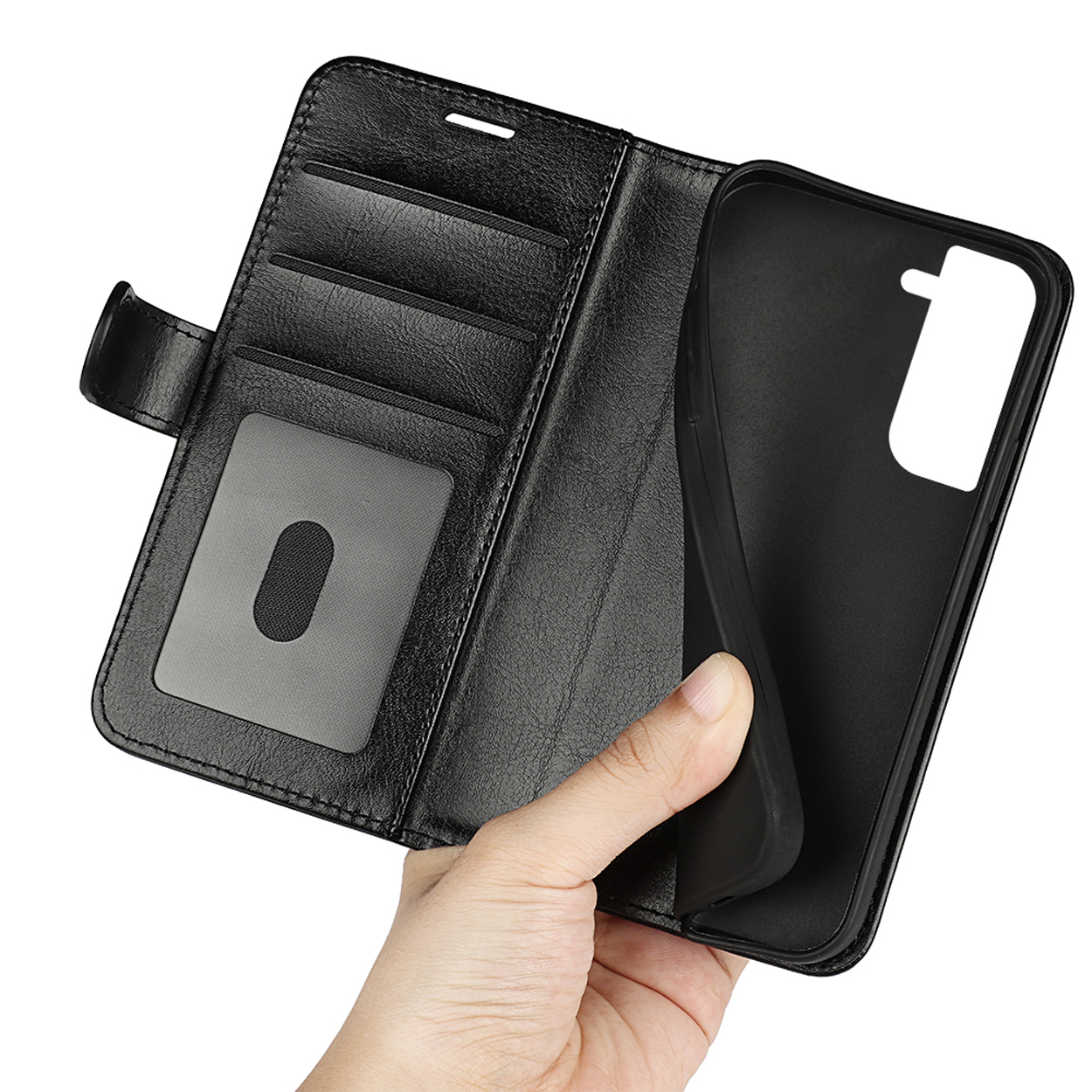 Étui de téléphone noir ouvert, montrant une main tenant le téléphone. L'étui est ouvert.