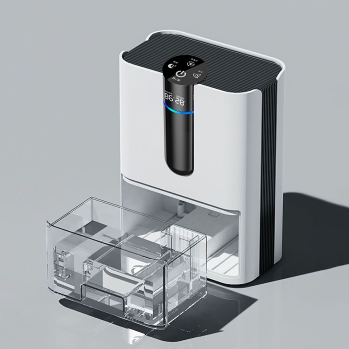 Ein weißer und schwarzer Luftentfeuchter mit transparentem Wassertank.