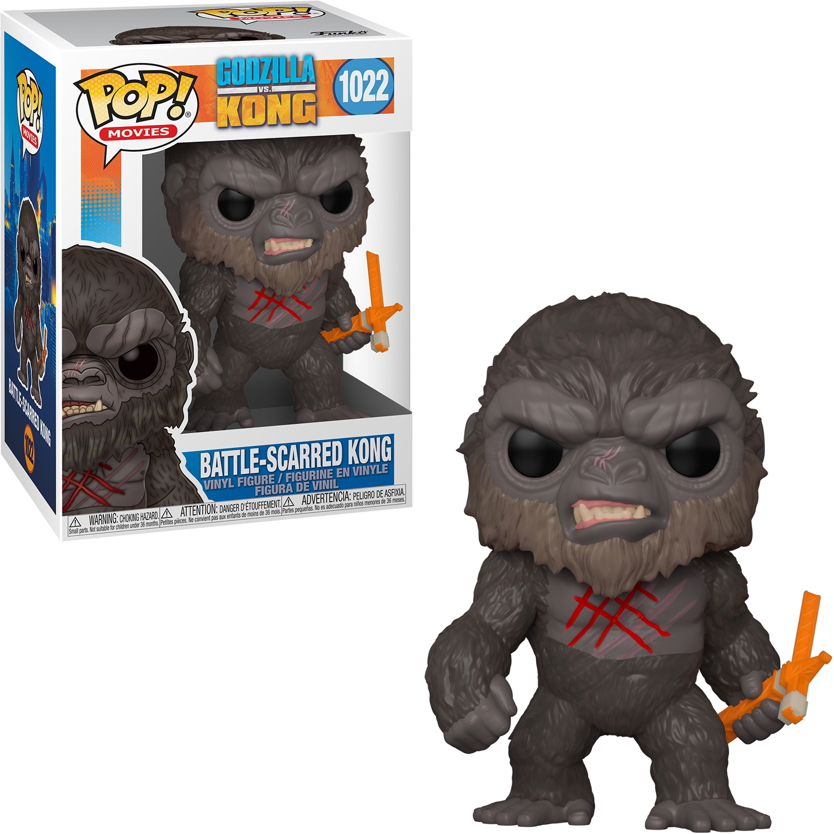 Una figura de vinilo gris de Kong con cicatrices y un arma naranja.