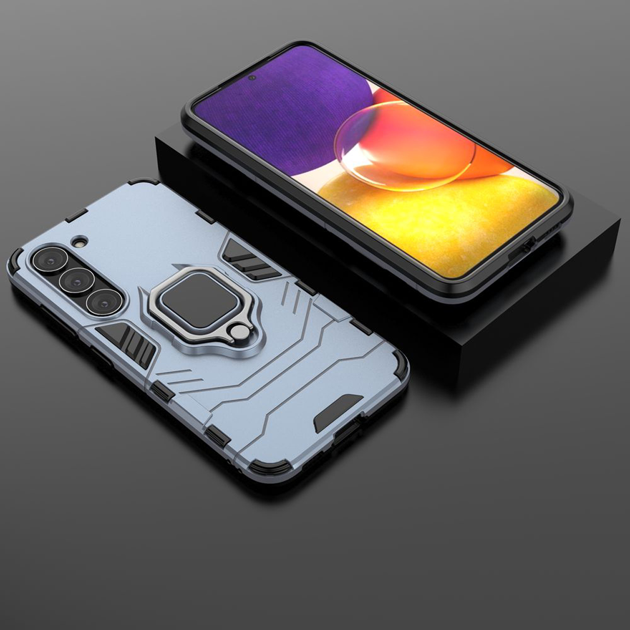 Blauwe telefoonhoes met ringhouder, een telefoon op zwart oppervlak.