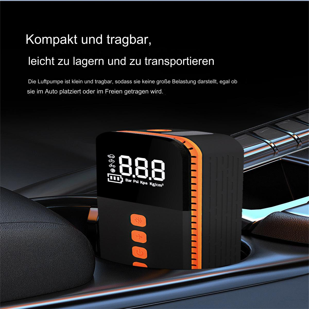 Eine schwarz-orangefarbene tragbare Luftpumpe, die Druckmesswerte anzeigt. Sie steht in einem Getränkehalter im Auto.