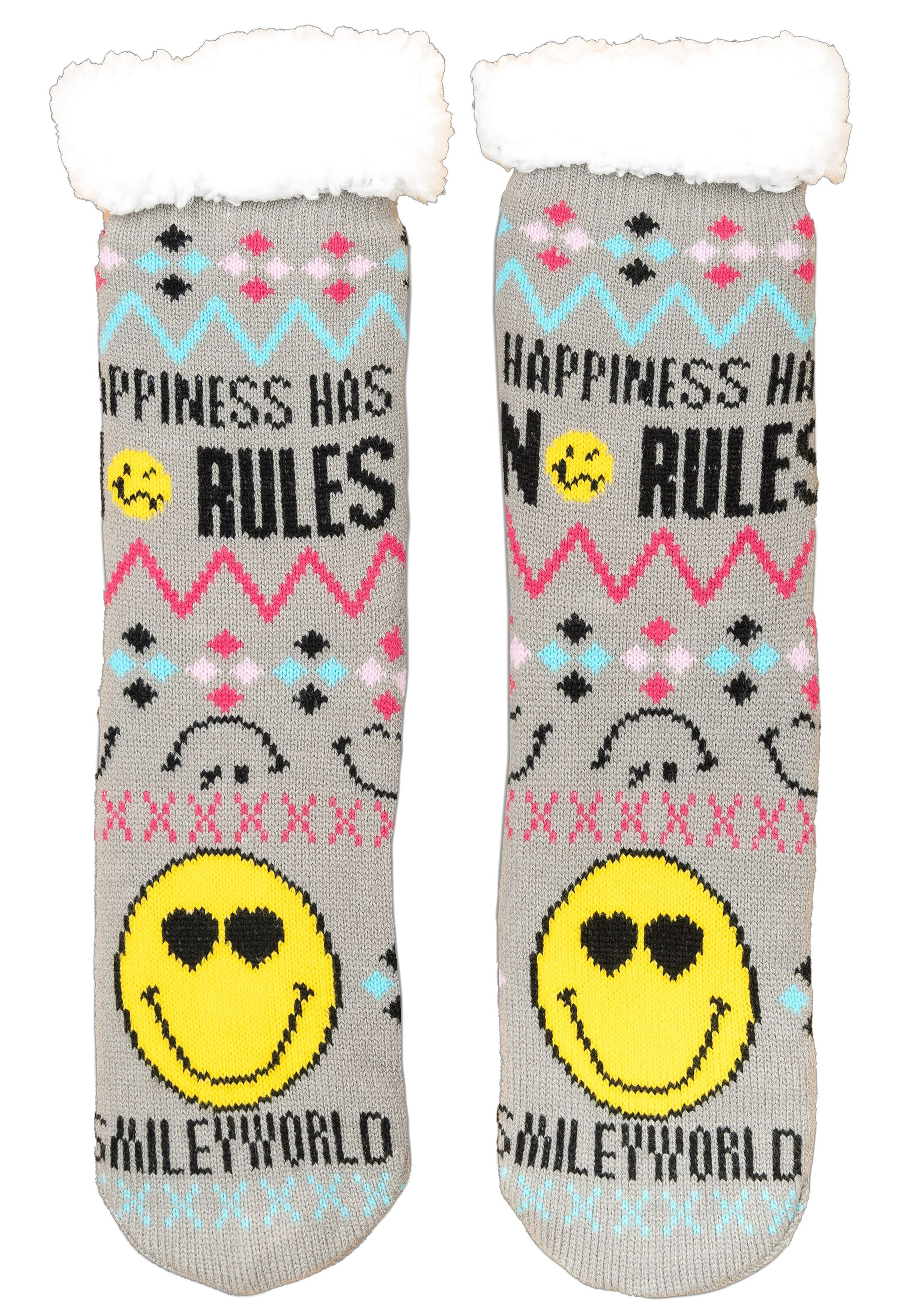 Ein Paar Weihnachtssocken mit Smiley-Gesicht und dem Schriftzug 'Happiness has no rules'.