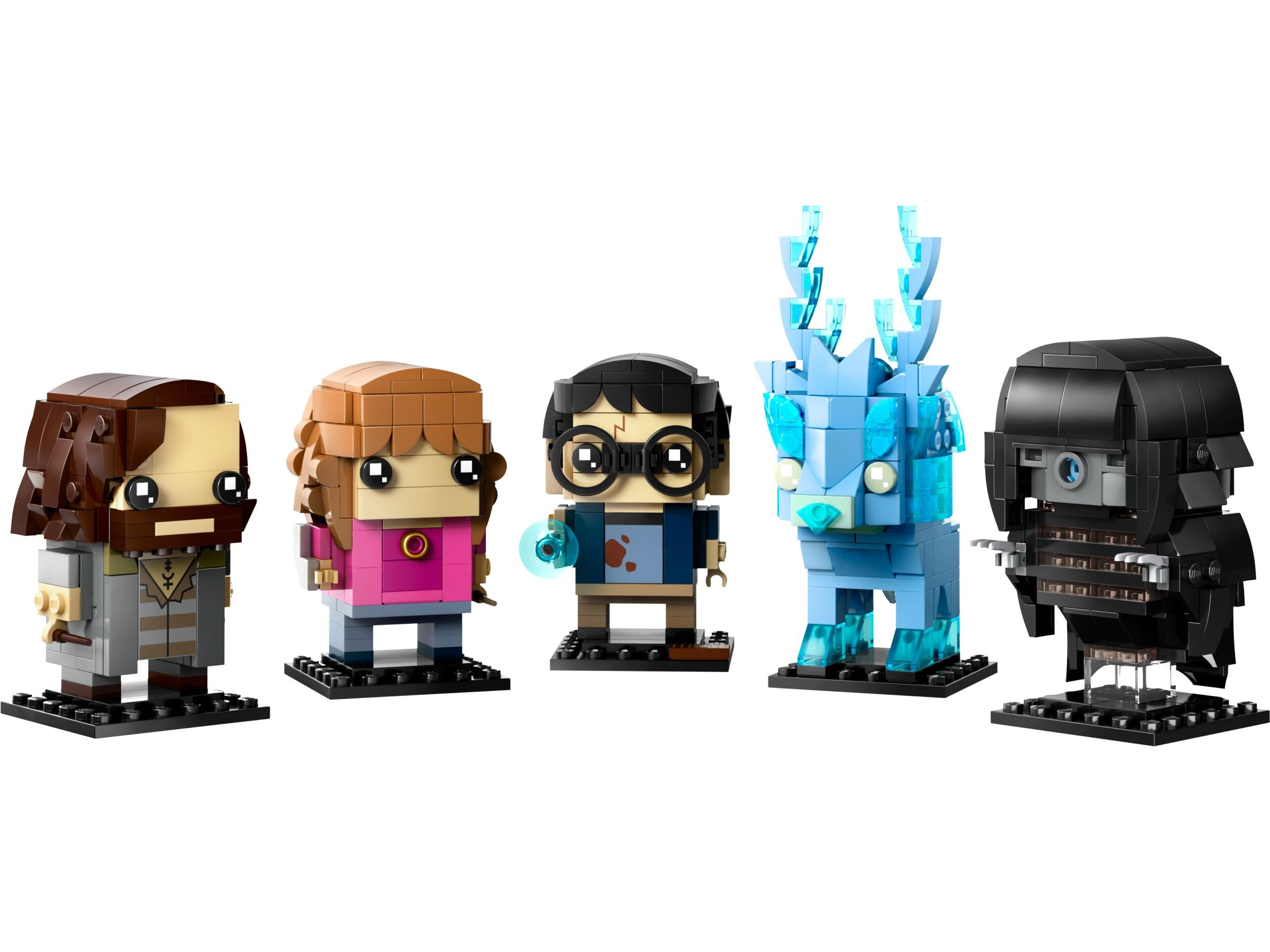 Fünf Lego-Figuren auf Weiß. Charaktere sind ein Zauberer, Hermine, Harry, ein Wesen und eine vermummte Figur.