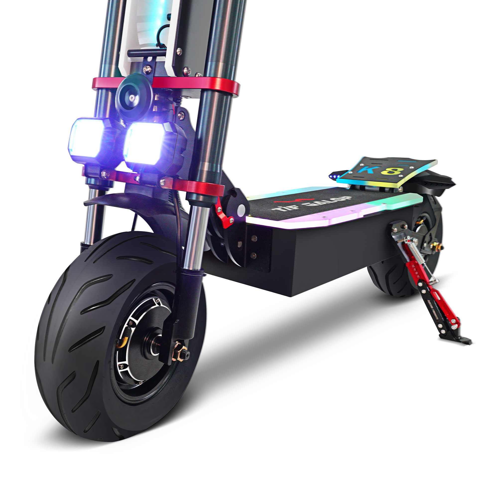 Czarno-czerwona hulajnoga elektryczna z jasnymi światłami i kolorową platformą.