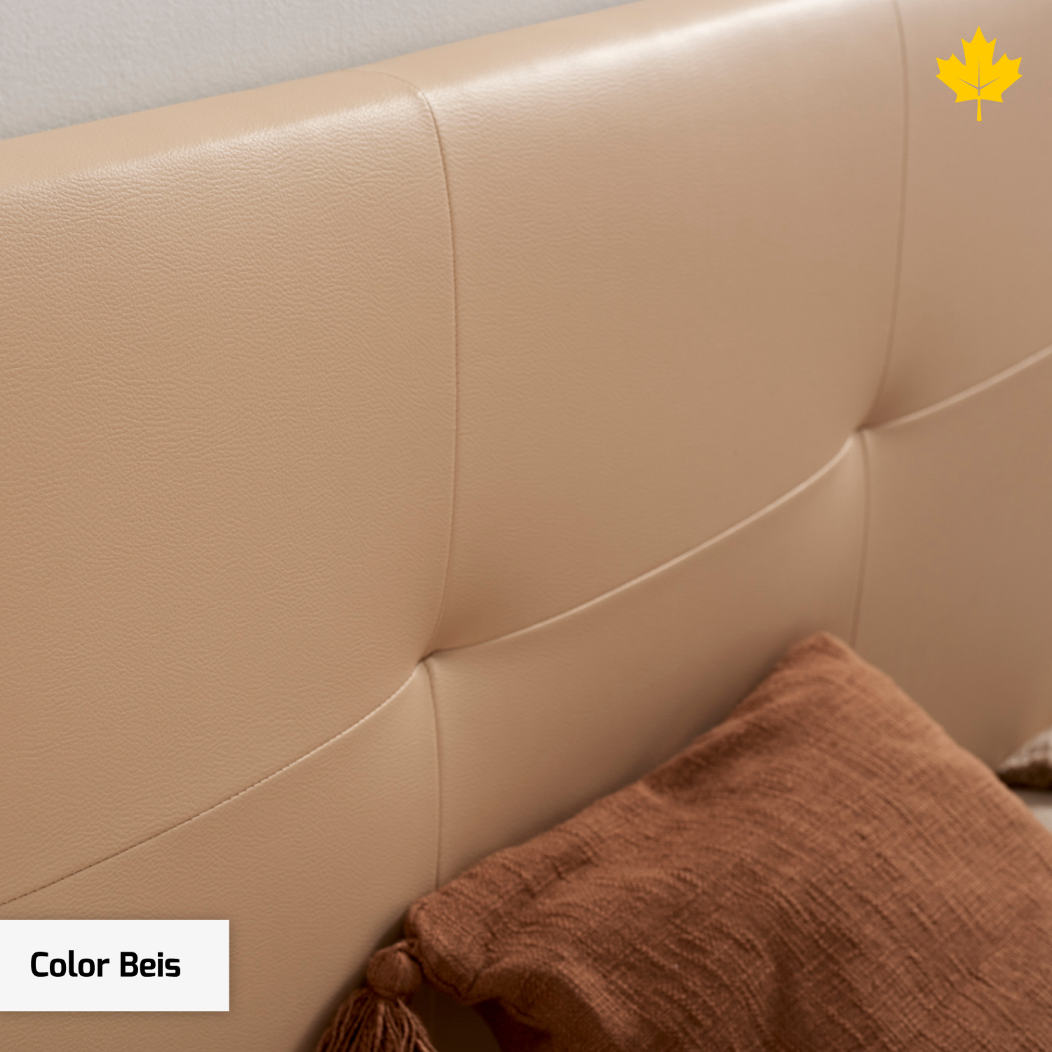 Un cabecero beige con almohada marrón y un logotipo de hoja de arce.