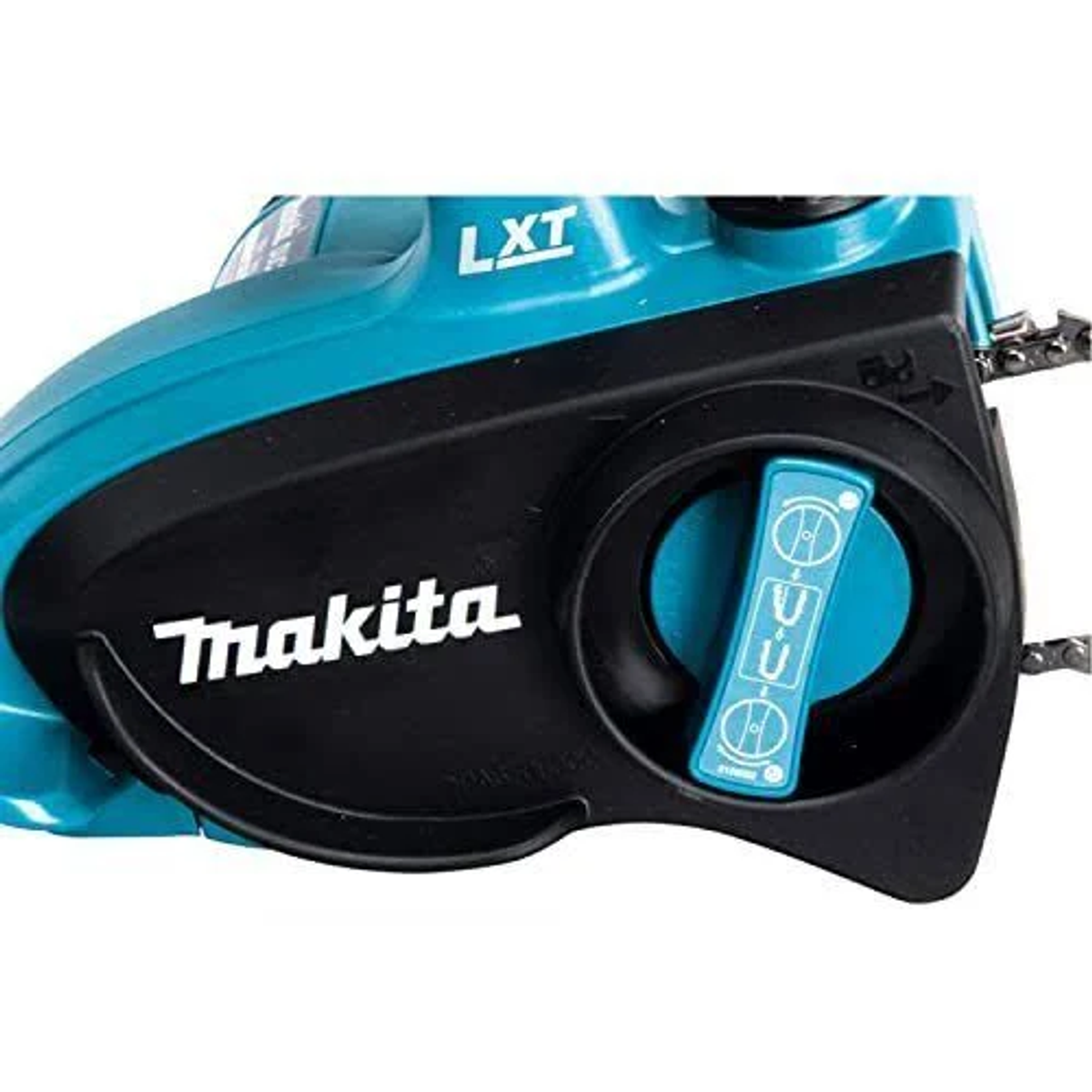 Gros plan sur le boîtier moteur d'une tronçonneuse Makita turquoise et noire.