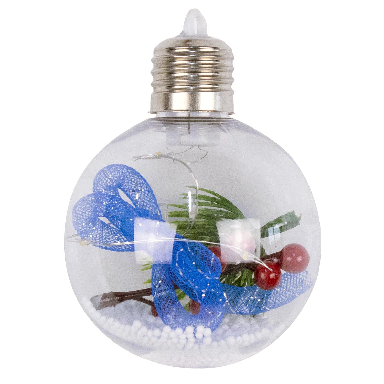 Eine klare Glühbirne mit Weihnachtsdekorationen: blaues Band, Beeren, Kiefer.