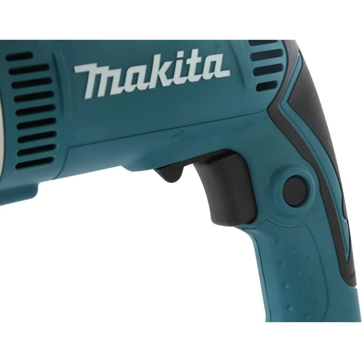 Primer plano del mango de taladro Makita, negro y turquesa, sobre fondo blanco.