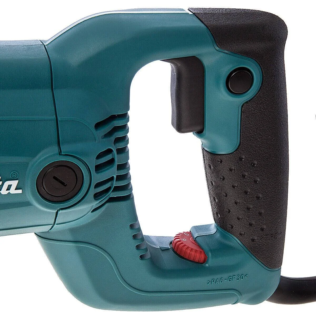 Primer plano del mango de un taladro Makita turquesa y negro con interruptor rojo.